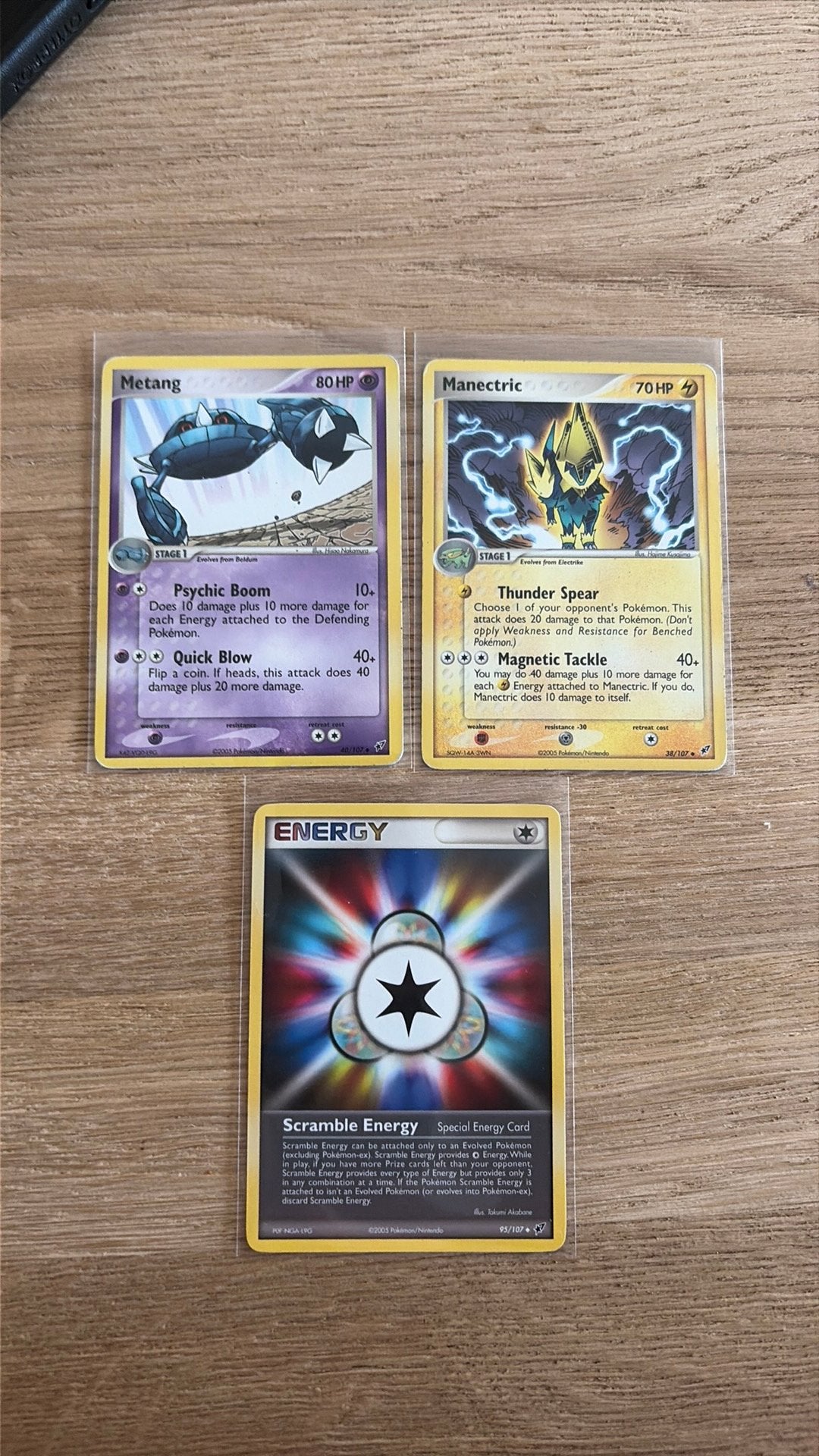 Deoxys - Metang, Manectric & Scramble energy, Ophalen of Verzenden, Zo goed als nieuw, Meerdere kaarten