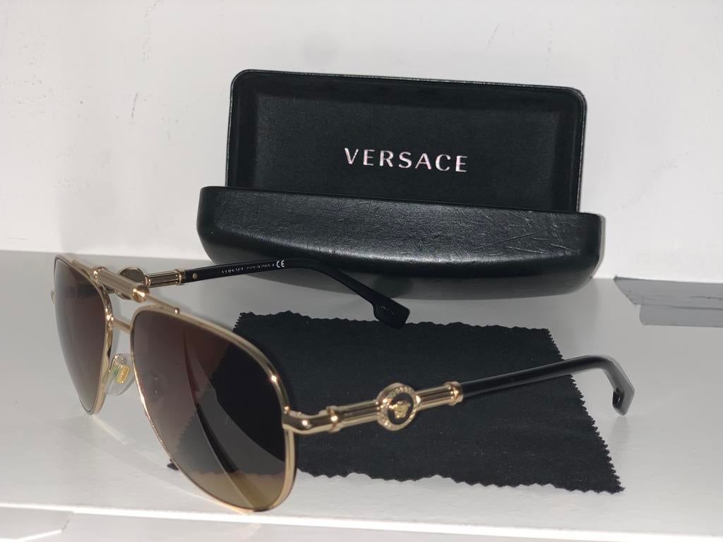 VERSACE Zonnebril Gold Unisex, Ophalen of Verzenden, Zo goed als nieuw, Overige kleuren, Overige merken