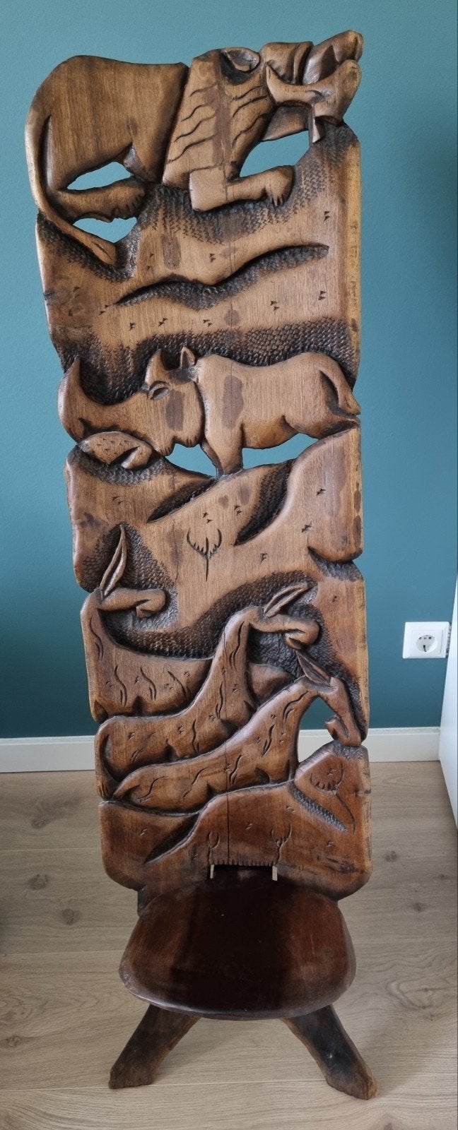 Handgesneden houten vouwstoel, Ophalen