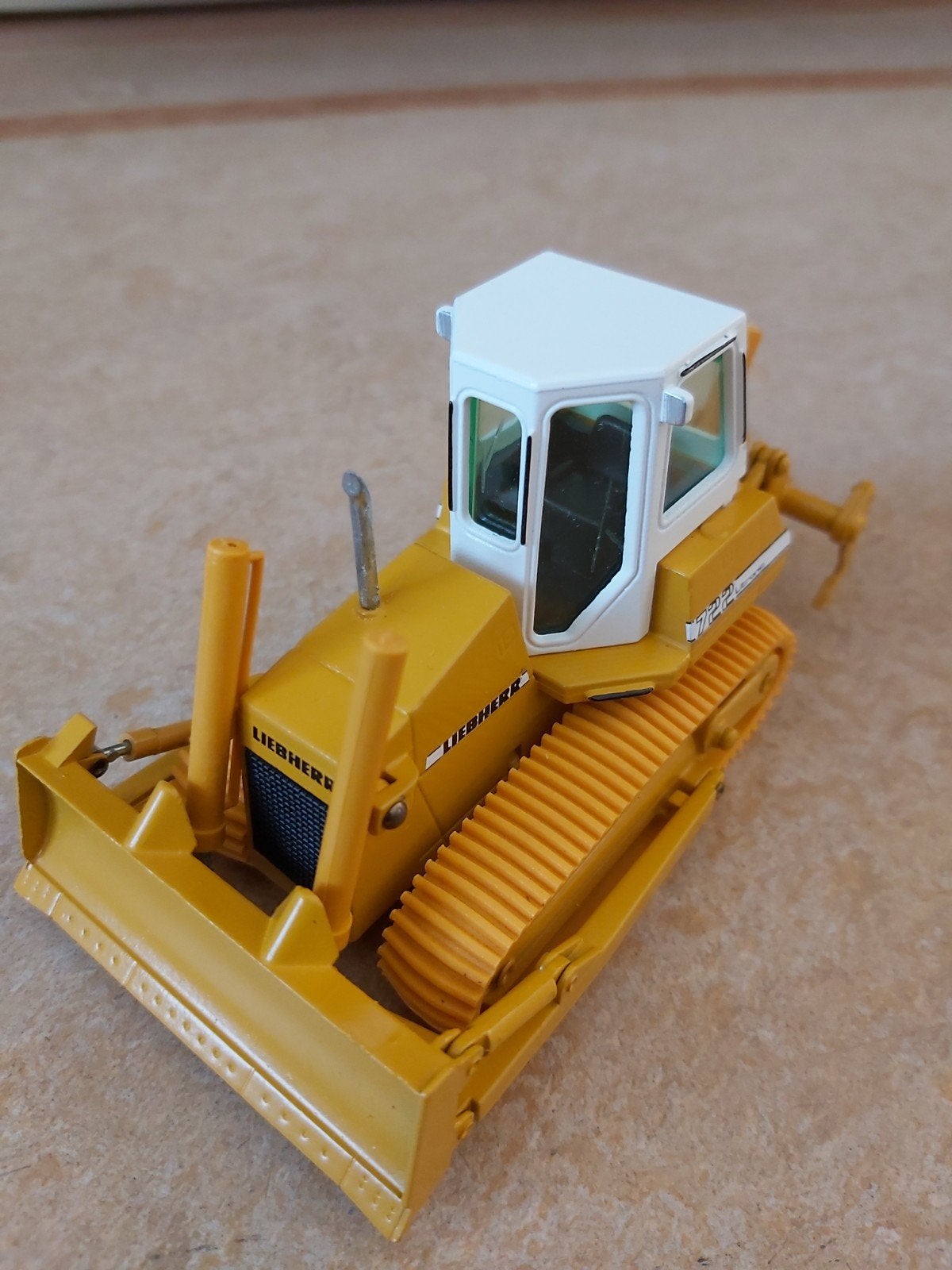 Liebherr PR722 hydr. bulldozer met ripper tanden Conrad 1/50, Ophalen of Verzenden, Nieuw, Overige typen, Conrad