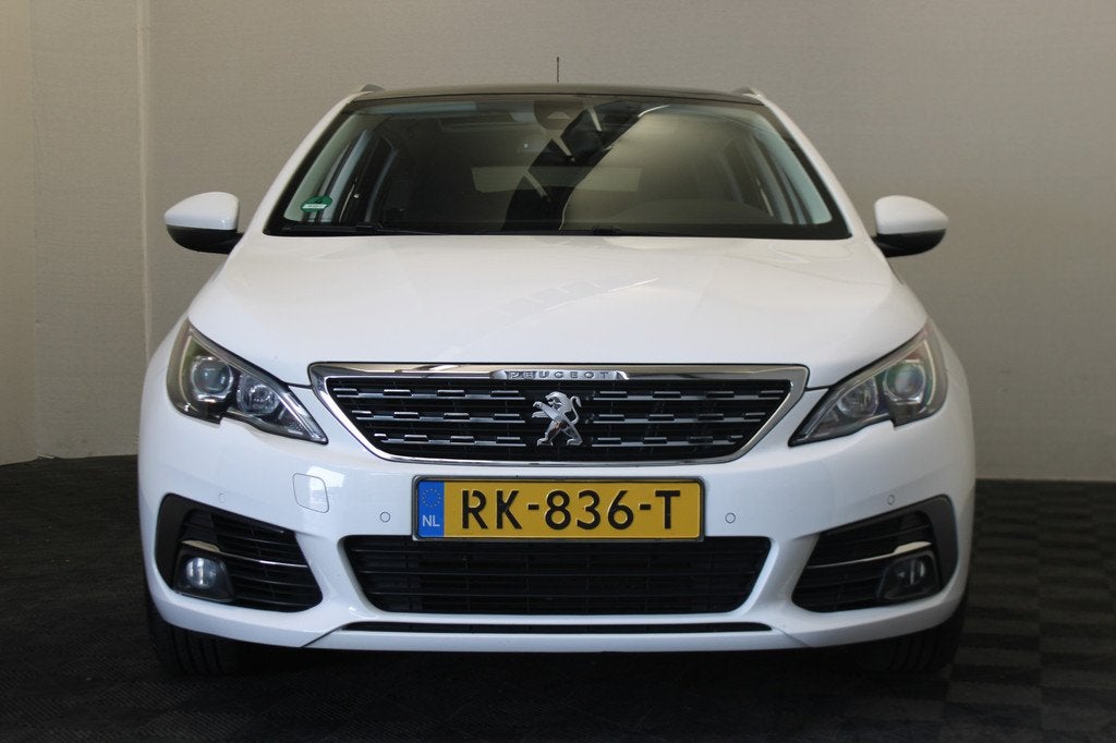 Peugeot 308 SW 1.2 PureTech Blue Lease Premium |Pano|Navi|Ca, Auto's, Gebruikt, 1199 cc, 635 kg, Leder en Stof