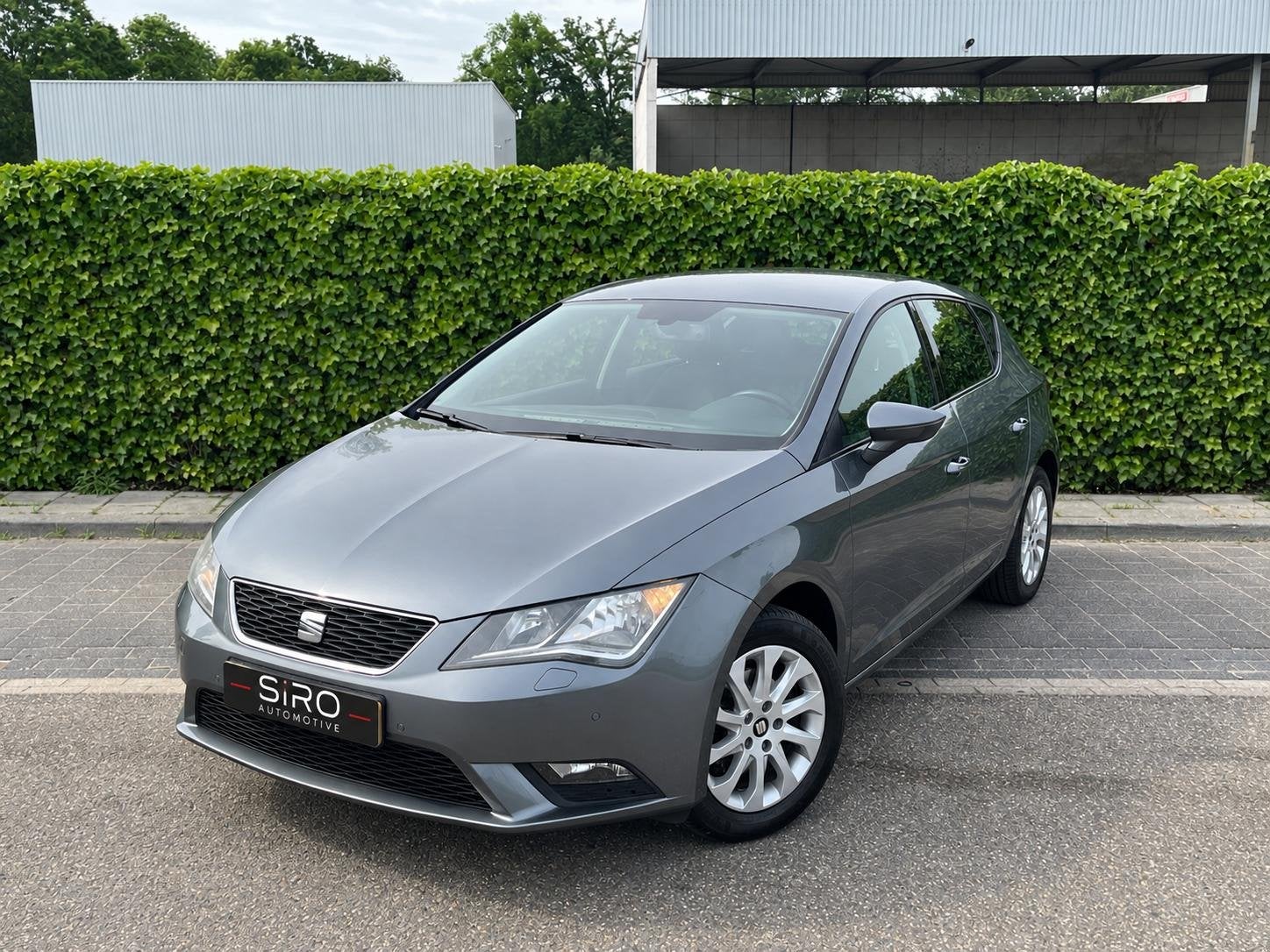 SEAT Leon 1.2 TSI Style * Airco * Cruise * Dealerond. * Gara, Auto's, Voorwielaandrijving, Euro 5, Gebruikt, Zwart
