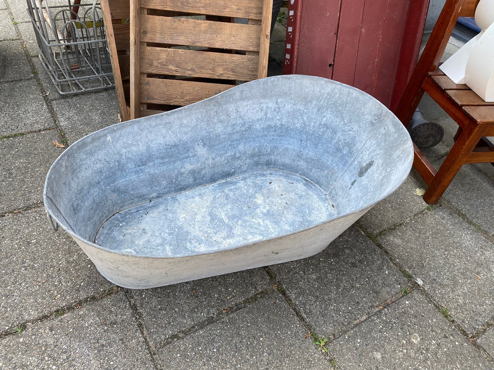 Zinken kinderbadje, Ophalen