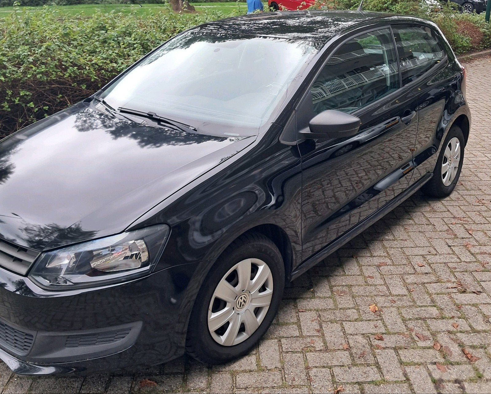 Foto 2 van Volkswagen Polo 1.2 uit 2012 Zwart, 169.193 KM, Airco