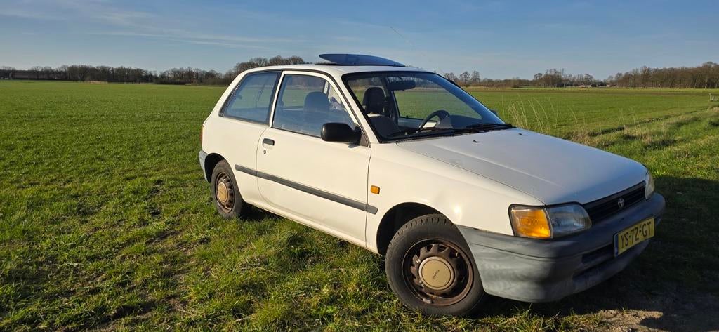 Toyota Starlet 1.3 XLI U9 1990 Wit, Auto's, Toyota, Stof, 74 pk, 4 cilinders, Starlet