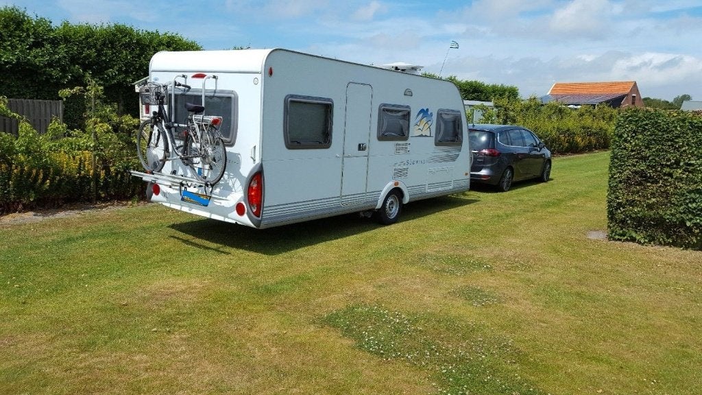Knaus Sudwind 500EU  Enkele bedden. mover. schotel. voortent, Caravans en Kamperen, Caravans, Rondzit, Particulier, 5 tot 6 meter