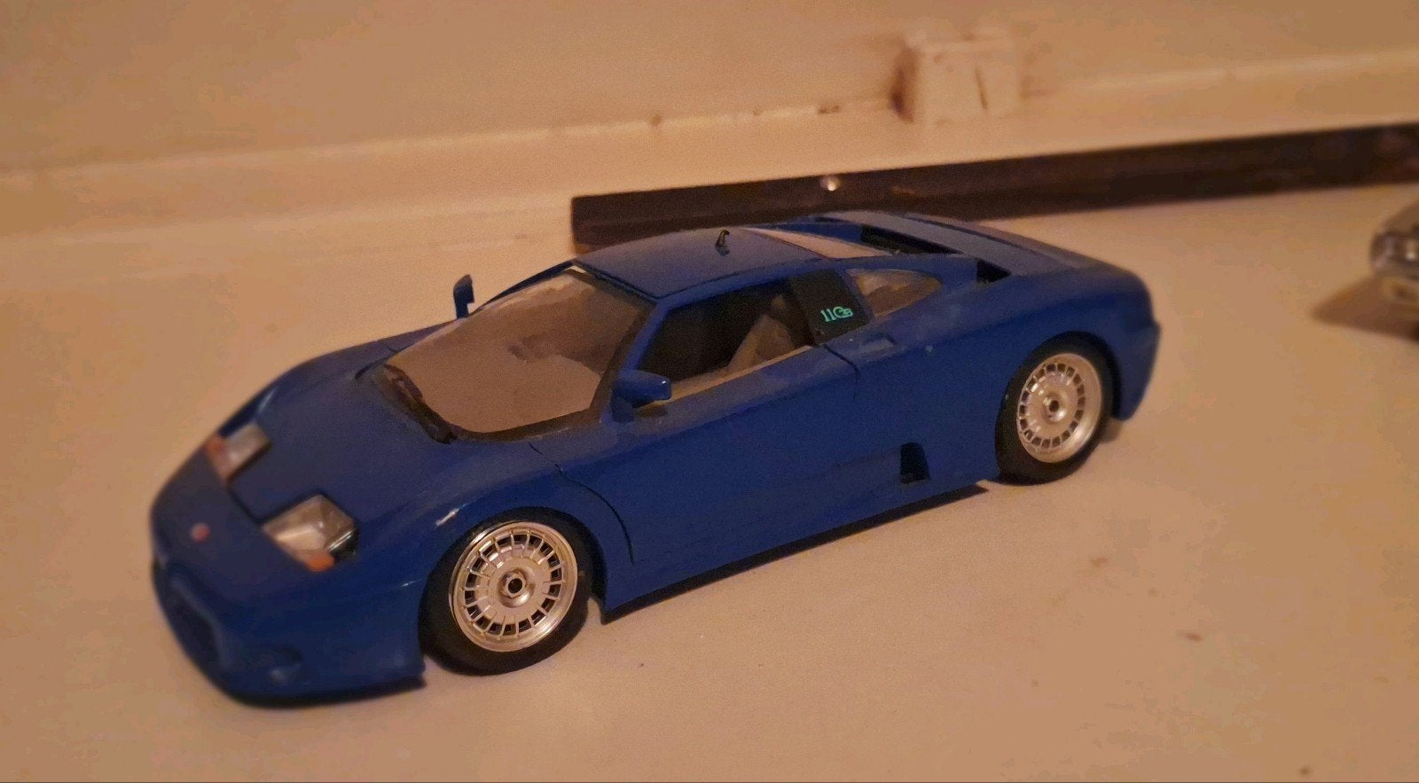 Bburago Bugatti EB110 - Iconische Blauwe Kleur - Schaal 1:18, Ophalen of Verzenden, Gebruikt, Auto, Bburago