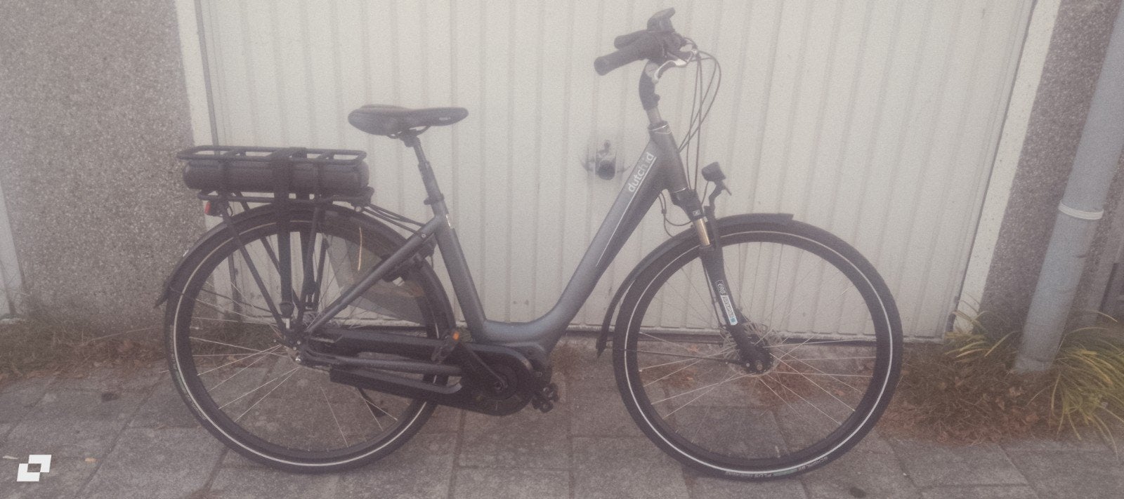 E-Bike Dutch-iD Comfort (SUNTOUR CR8) 7V, Ophalen, Zo goed als nieuw, Handrem