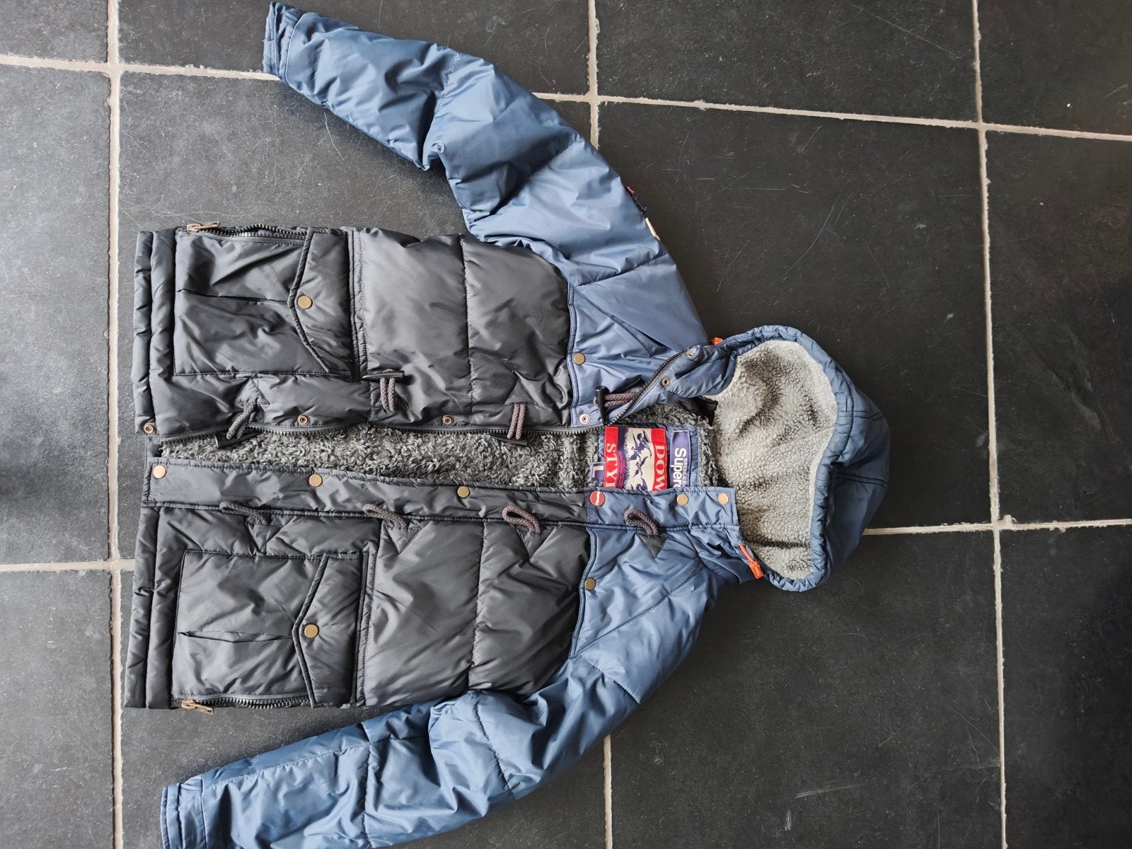 Superdry Winterjas Maat L - Zo goed als nieuw, Kleding | Heren, Ophalen, Maat 52/54 (L), Blauw, Zo goed als nieuw