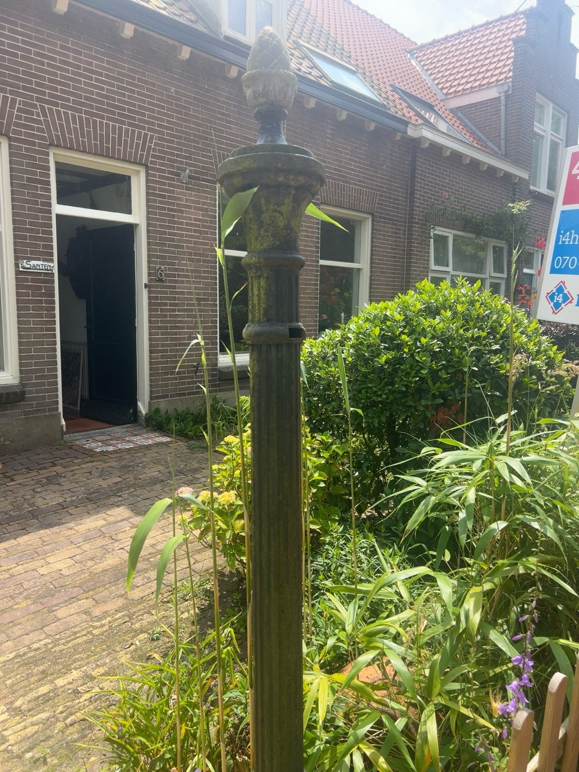 Antieke gietijzeren lantaarnpaal, Ophalen
