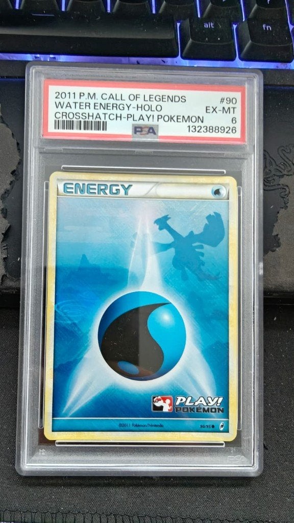 2011 P.M. Call of Legends Water Energy Holo PSA 6, Ophalen of Verzenden, Gebruikt, Losse kaart, Foil