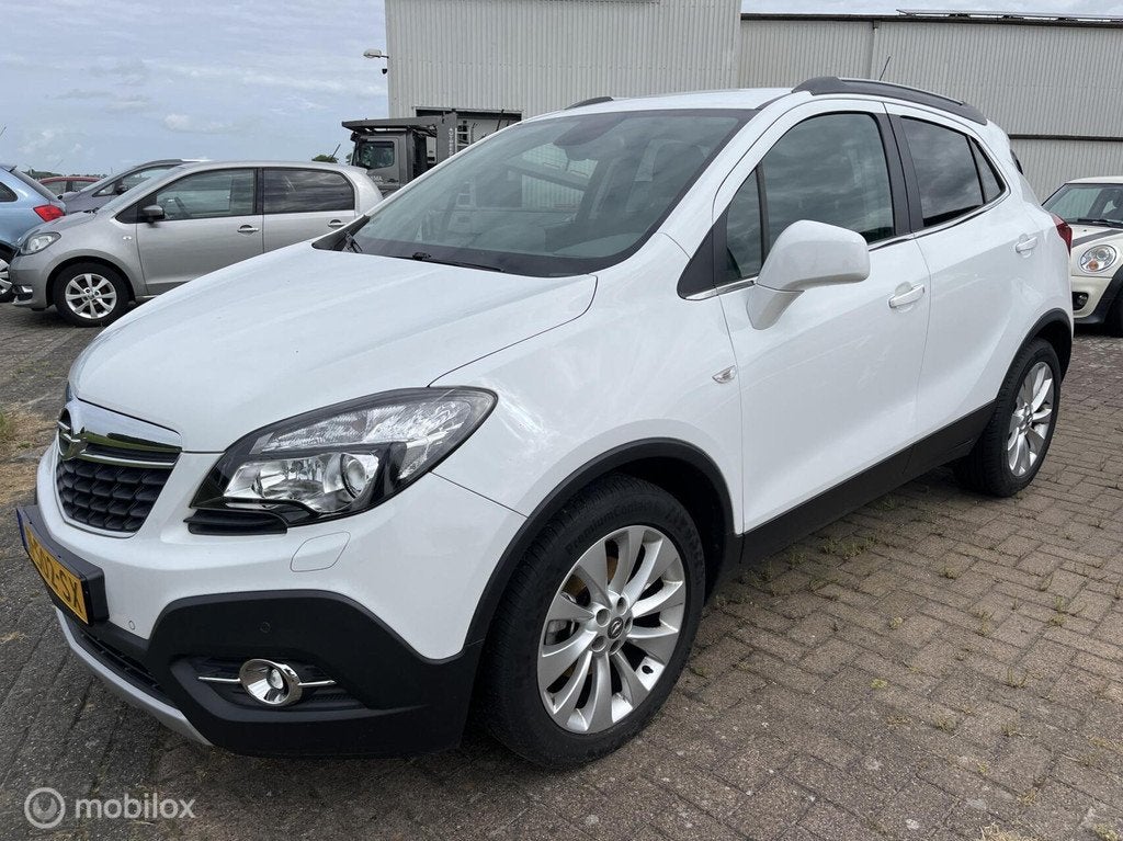 Opel Mokka 1.4 T Cosmo 4x4, Auto's, Gebruikt, Zwart, 4 cilinders, Leder en Stof