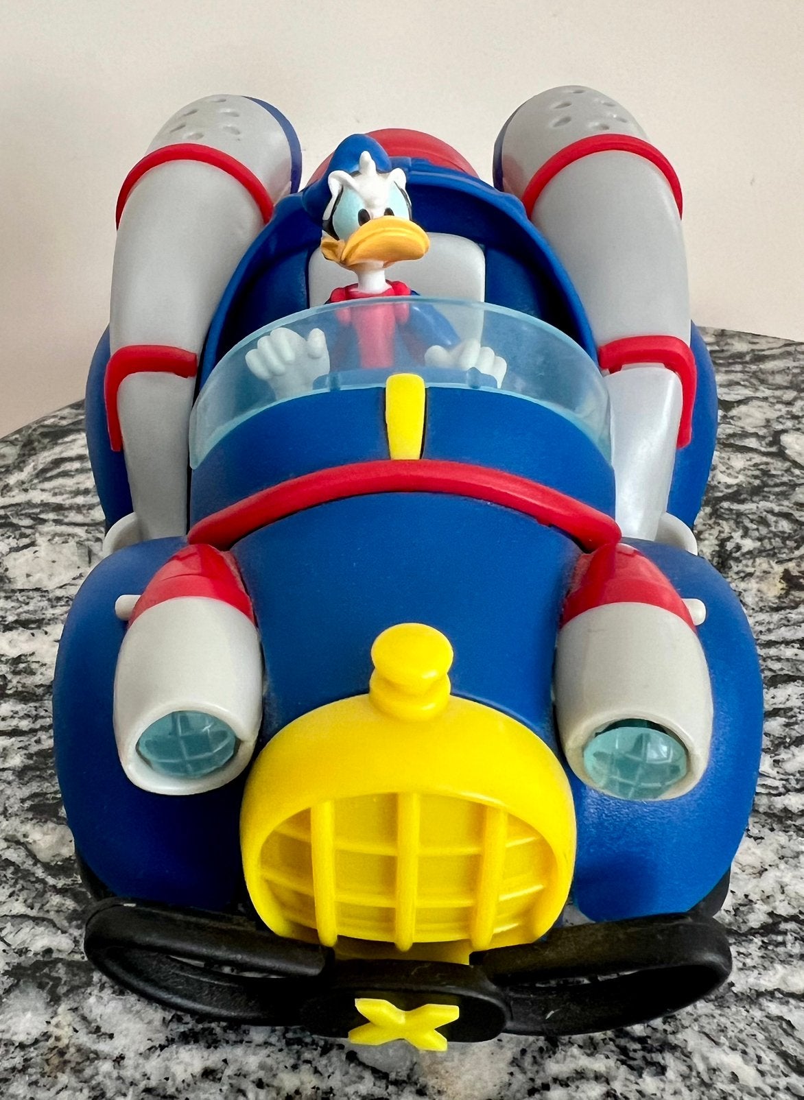 Donald Duck Speelgoed Auto met Raketten en Uitklapwielen, Ophalen, Donald Duck, Zo goed als nieuw, Beeldje of Figuurtje