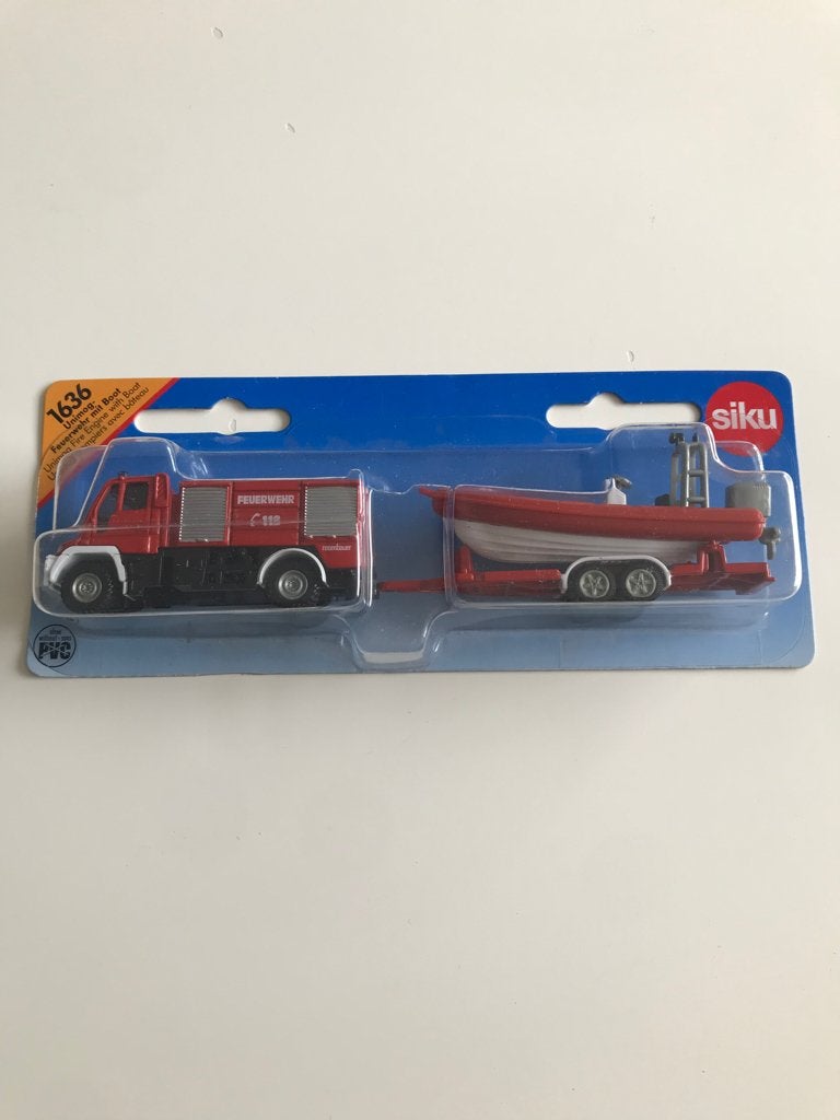SIKU Unimog Brandweerwagen met boot, Ophalen of Verzenden, Zo goed als nieuw, Overige typen