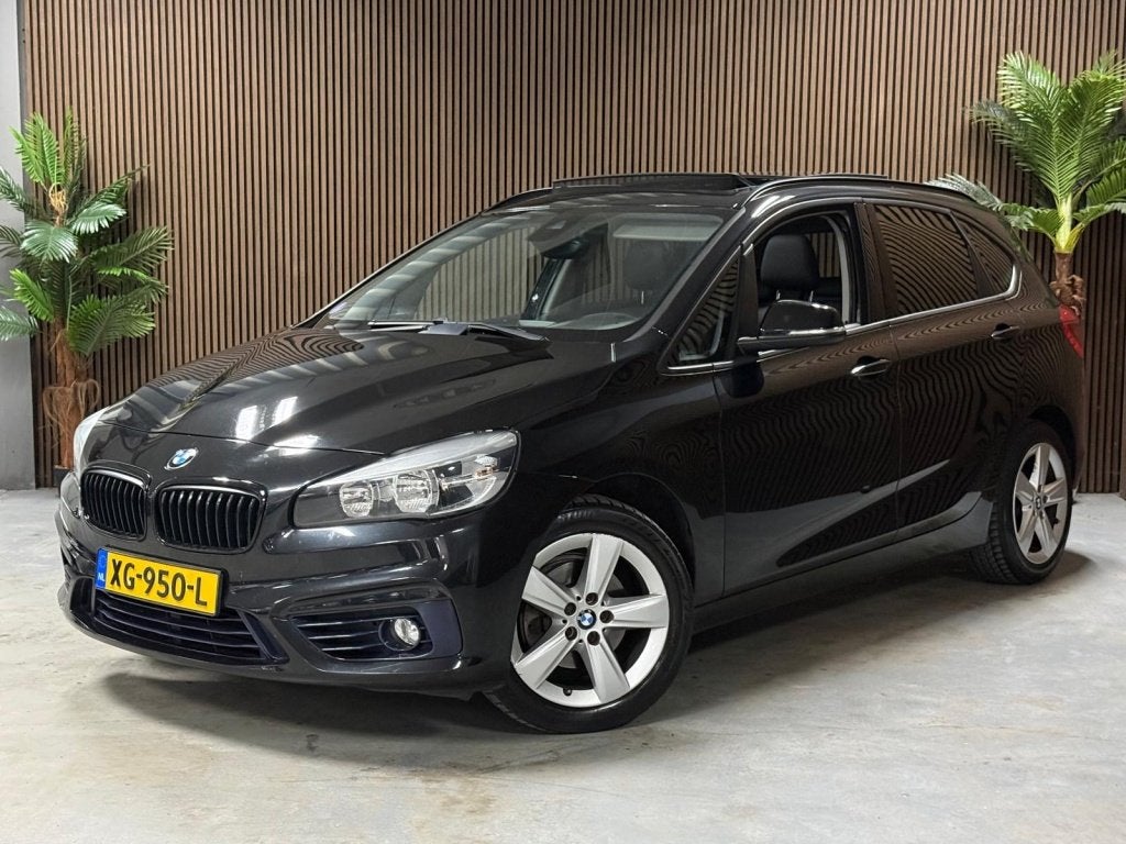BMW 2 Serie Active Tourer 218i High Executive (bj 2015), Auto's, Voorwielaandrijving, 136 pk, Gebruikt, Zwart