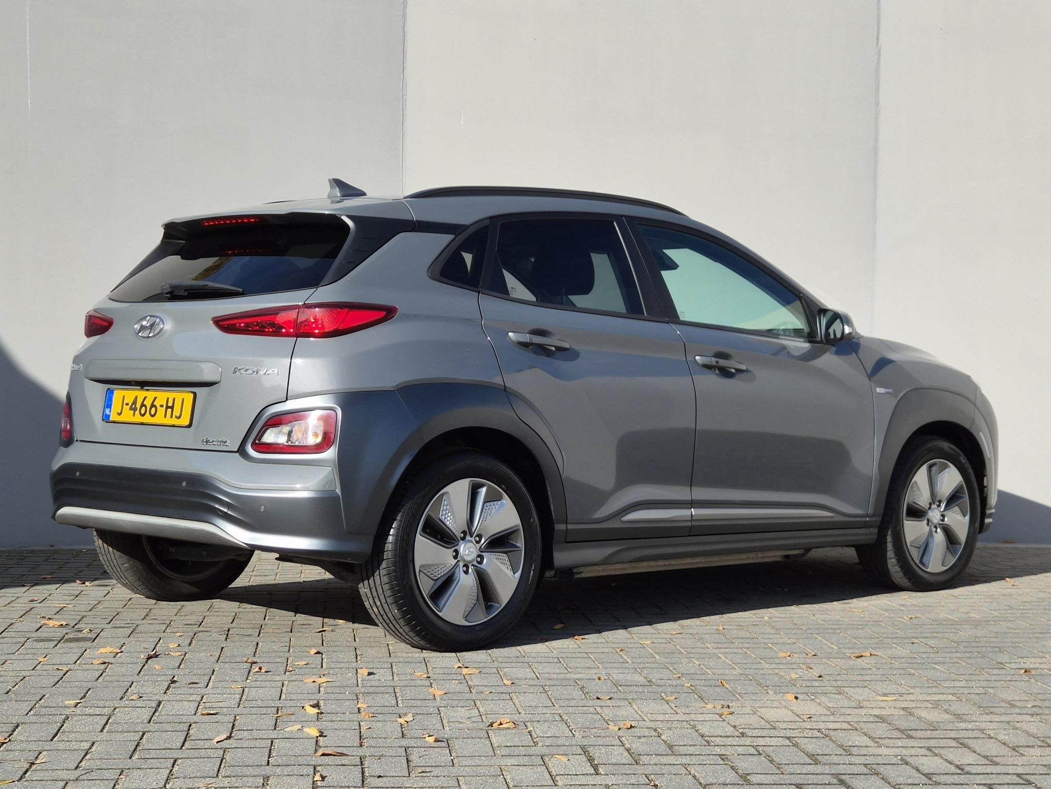 Hyundai Kona EV Fashion 39 kWh / SOH 94% / Dealer onderhoude, Auto's, Dealer onderhouden, Gebruikt, Verwarmde buitenspiegels, Origineel Nederlands