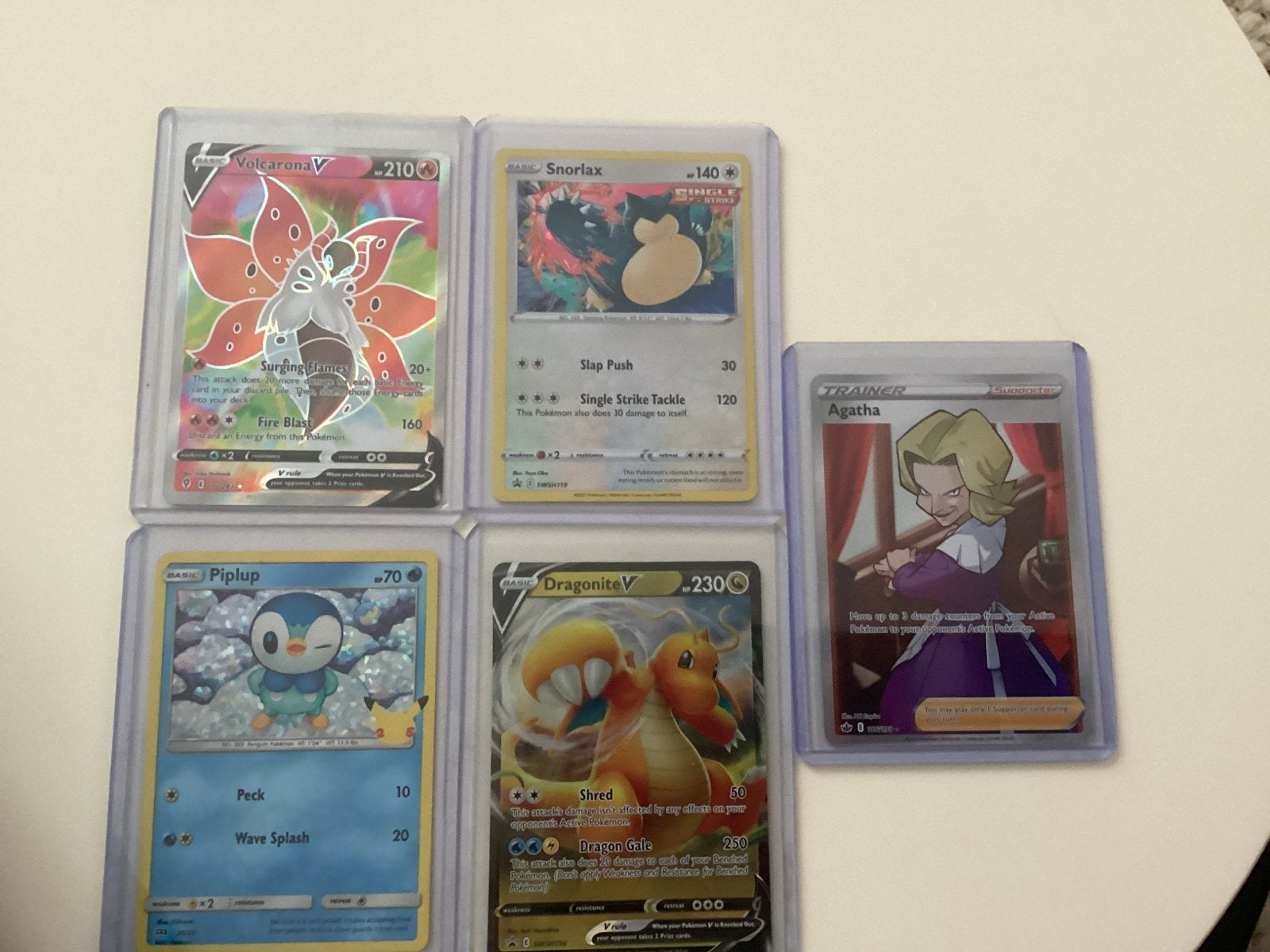Pokémon kaarten V, VMAX, Full Art - Volcarona, Dragonite,, Ophalen of Verzenden, Zo goed als nieuw, Meerdere kaarten