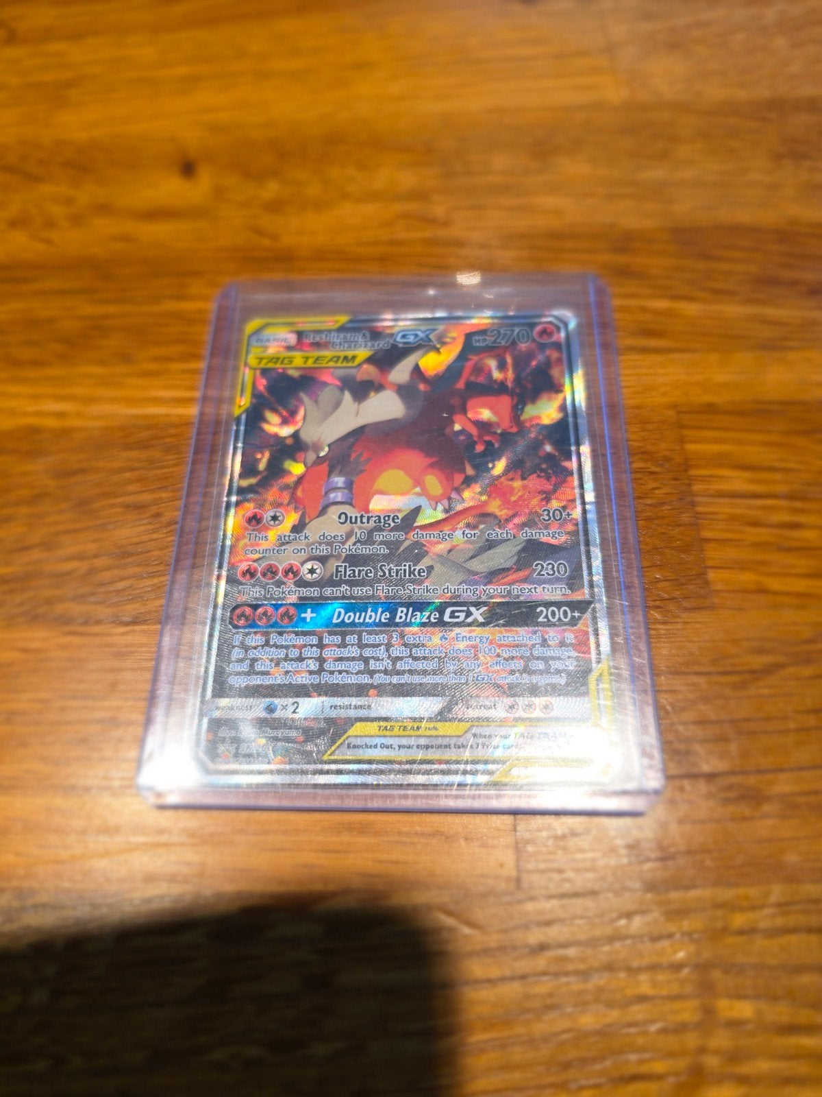 Reshiram & Charizard GX • Sun & Moon Promo, Ophalen of Verzenden, Zo goed als nieuw, Losse kaart, Foil