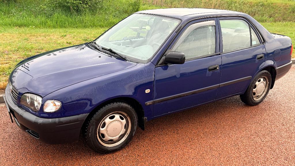 Toyota Corolla BJ 2000, Auto's, Voorwielaandrijving, Stof, 1398 cc, 95 pk