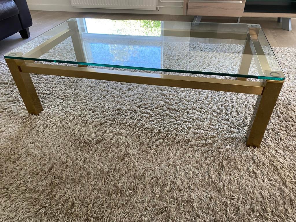 Glazen salon tafel met goudkleurig metaal onderstel, Ophalen, Gebruikt, 100 tot 150 cm, 50 tot 100 cm