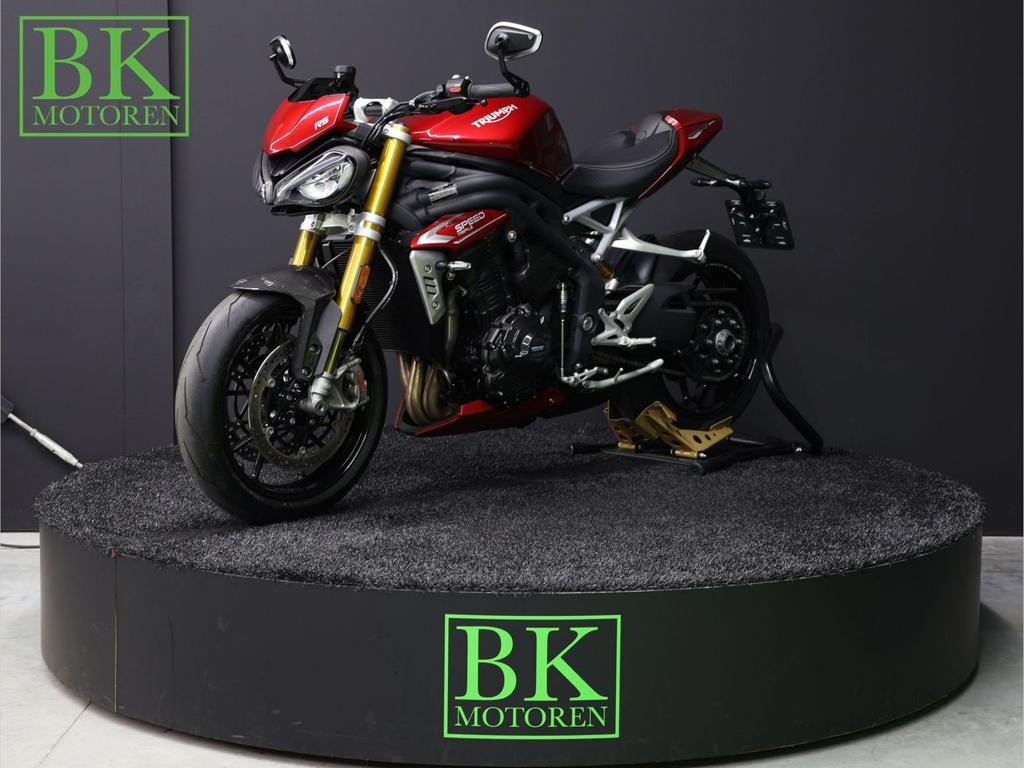 TRIUMPH SPEED TRIPLE 1200 RS | Carnival Red | Leovince, 1160 cc, Motorrijbewijs A, Bedrijf, Meer dan 35 kW