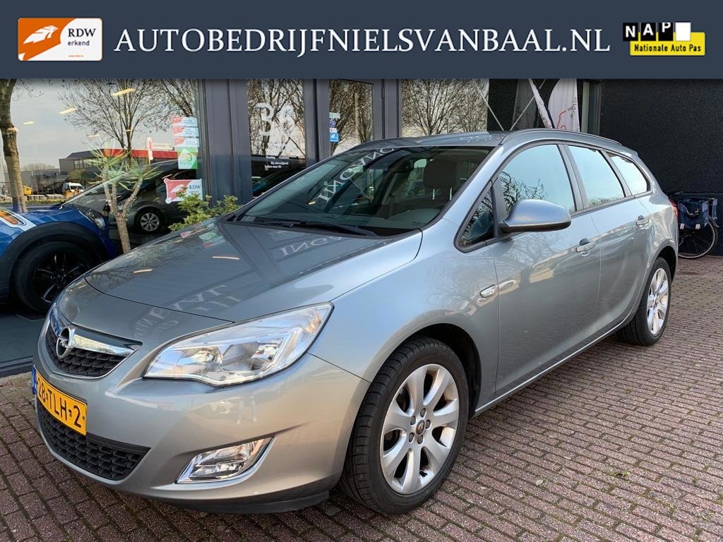 Opel Astra Sports Tourer 1.4 Edition Clima/Navi/PDC/Cruise, Auto's, Opel, Voorwielaandrijving, Gebruikt, 4 cilinders, Origineel Nederlands