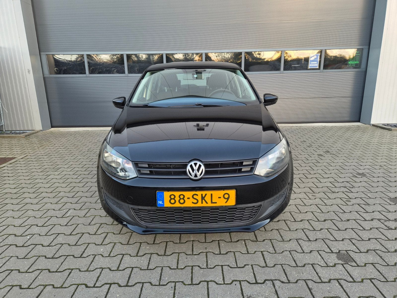 Volkswagen Polo 1.2 5D 2011 Zwart l Orig NL l Nap l 2e eige, Voorwielaandrijving, 40 €/maand, 1198 cc, Zwart