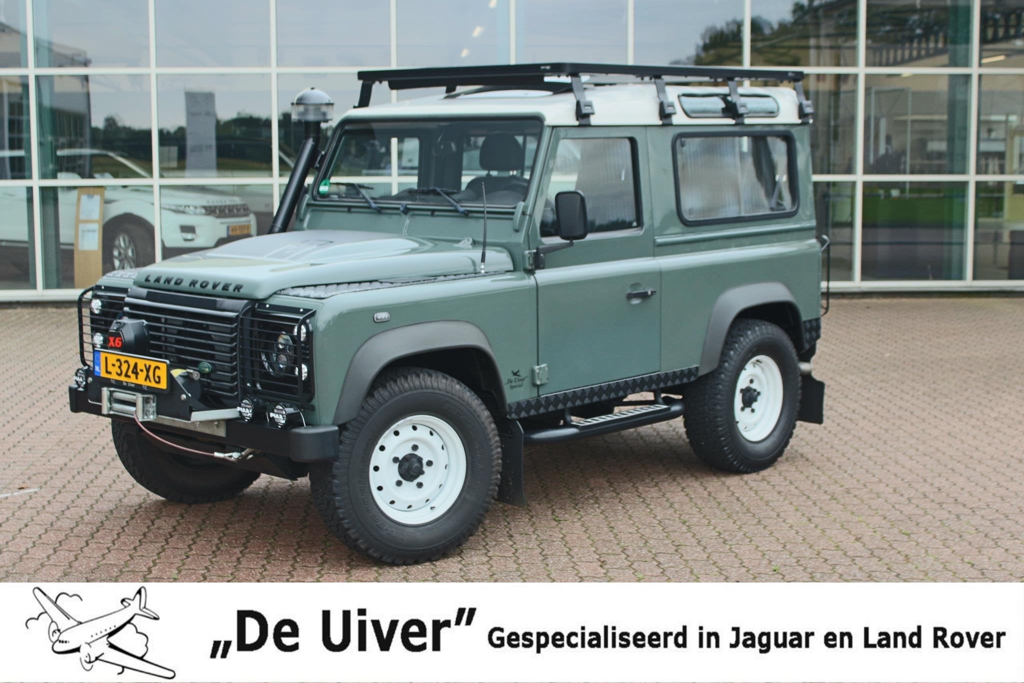 Land Rover Defender 2.4 TD 90 SW De Uiver Special + Aircondi, Auto's, 12 maanden, Gebruikt, Zwart, 4 cilinders