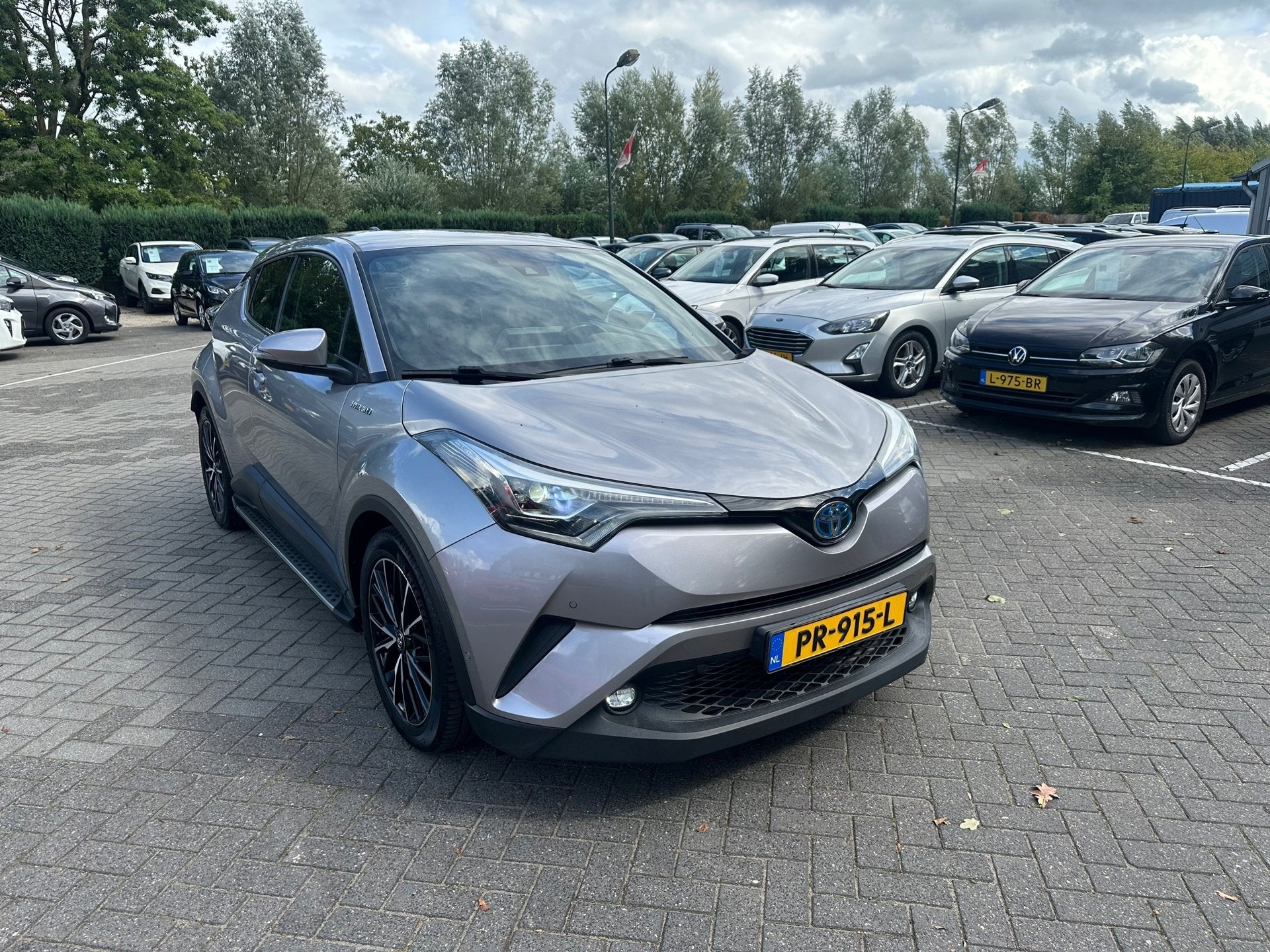 Toyota C-HR 1.8 Hybrid Premium , navigatie , camera , pdc ,, Auto's, Dealer onderhouden, Euro 6, 4 cilinders, Leder en Stof
