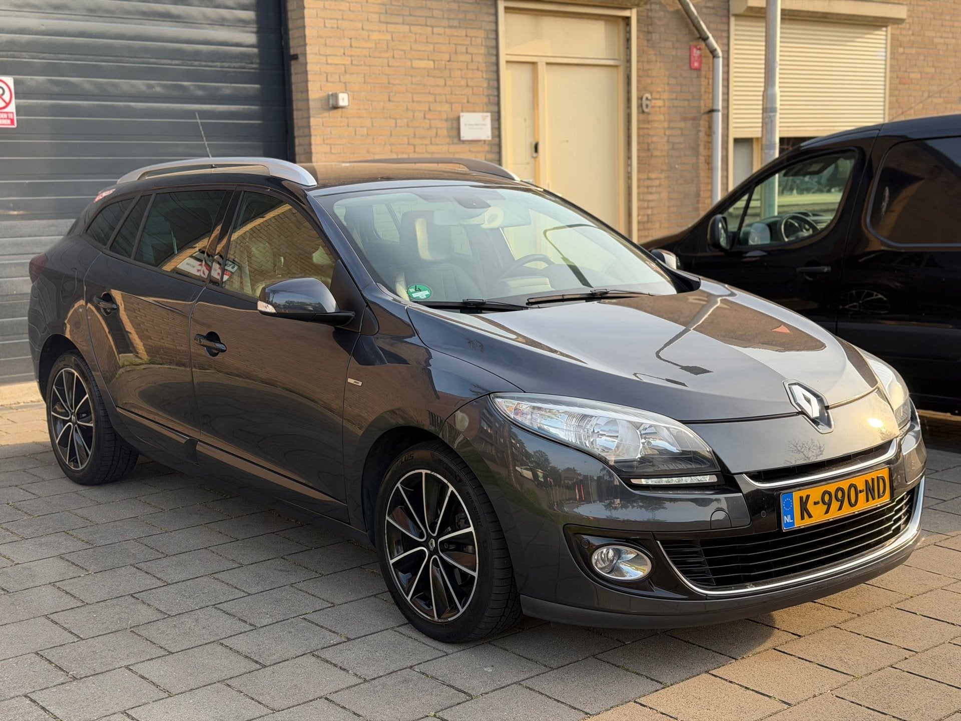 Renault Mégane Estate 1.2 TCe Bose SartStop Apk Clima Cruis, Auto's, Voorwielaandrijving, Gebruikt, Zwart, 4 cilinders