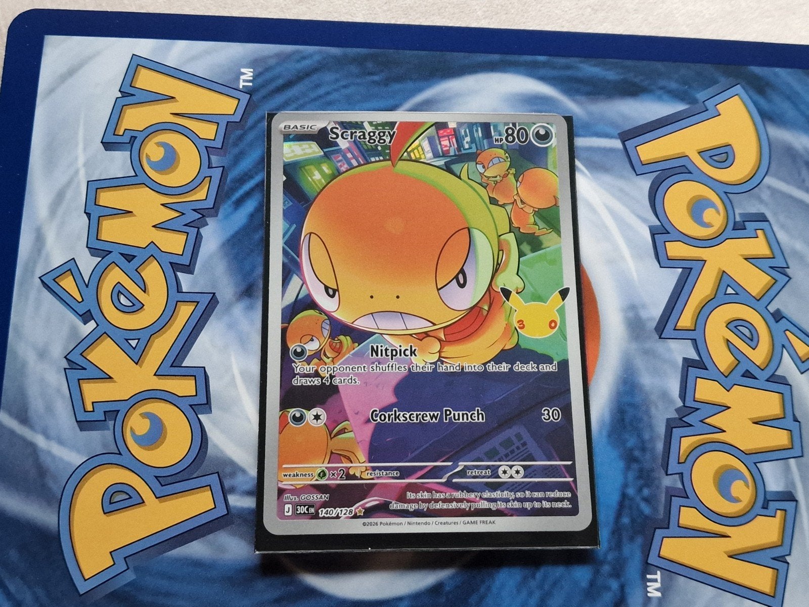 Scraggy Pokémon kaart (140/128) - 30th Anniversary, Ophalen of Verzenden