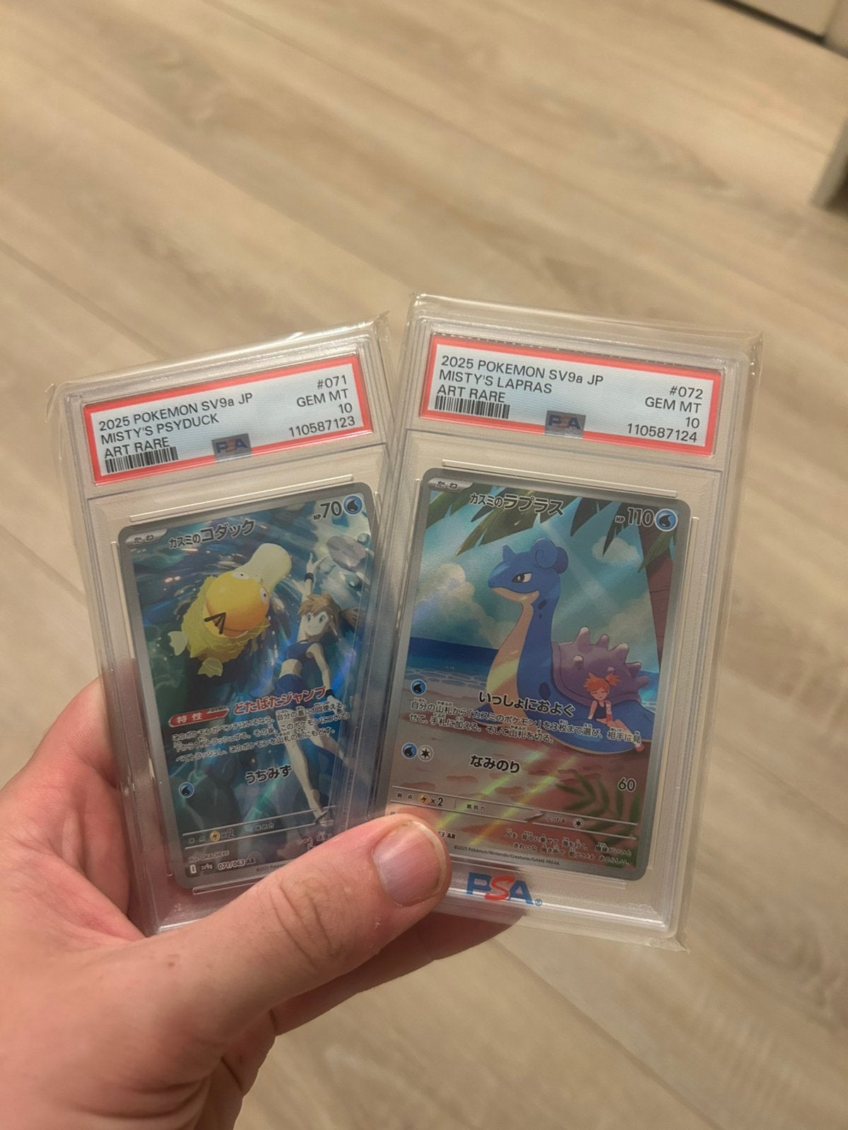 PSA10 Misty’s Psyduck & Lapras SEQUENTIAL japans, Ophalen of Verzenden, Zo goed als nieuw