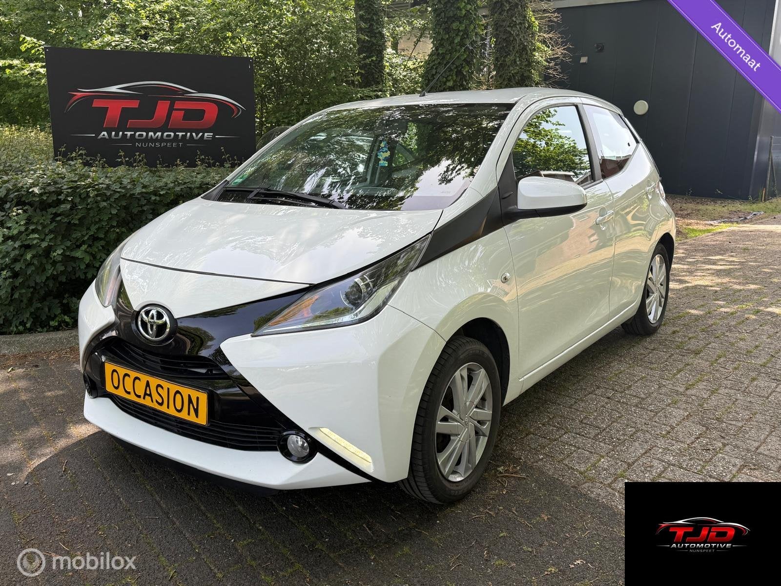 Toyota Aygo 1.0 VVT-i x-pure AUTOMAAT-AIRCO-CAMERA-NAVI, Auto's, Stof, Gebruikt, Overige carrosserieën, 4 stoelen