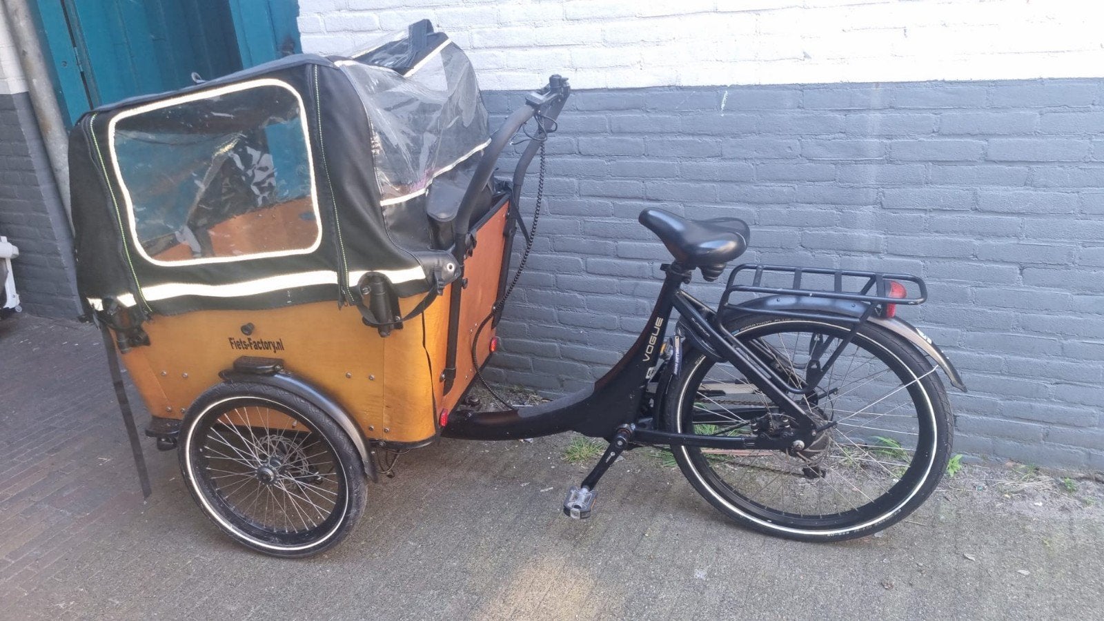 Fietsenmaker Den Haag gezocht Vogue Carry 3, Fietsen en Brommers, Fietsen | Bakfietsen, Overige merken, Gebruikt, Huif, Ophalen of Verzenden