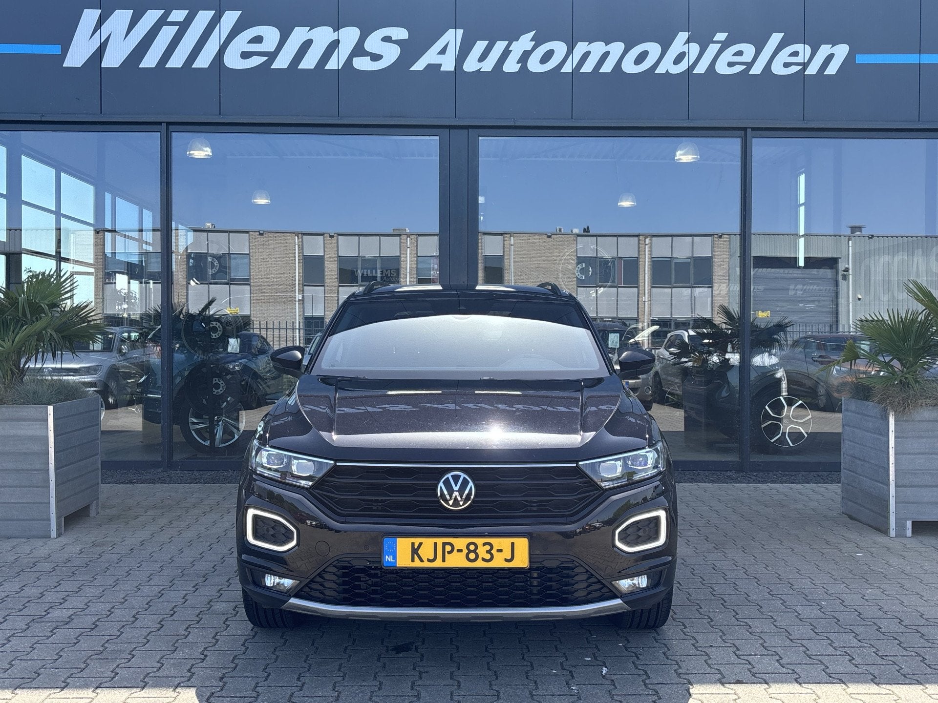 Volkswagen T-Roc 1.5 TSI Sport Business R Stoelverwarming, A, Auto's, Volkswagen, Euro 6, 4 cilinders, Leder en Stof, Zwart