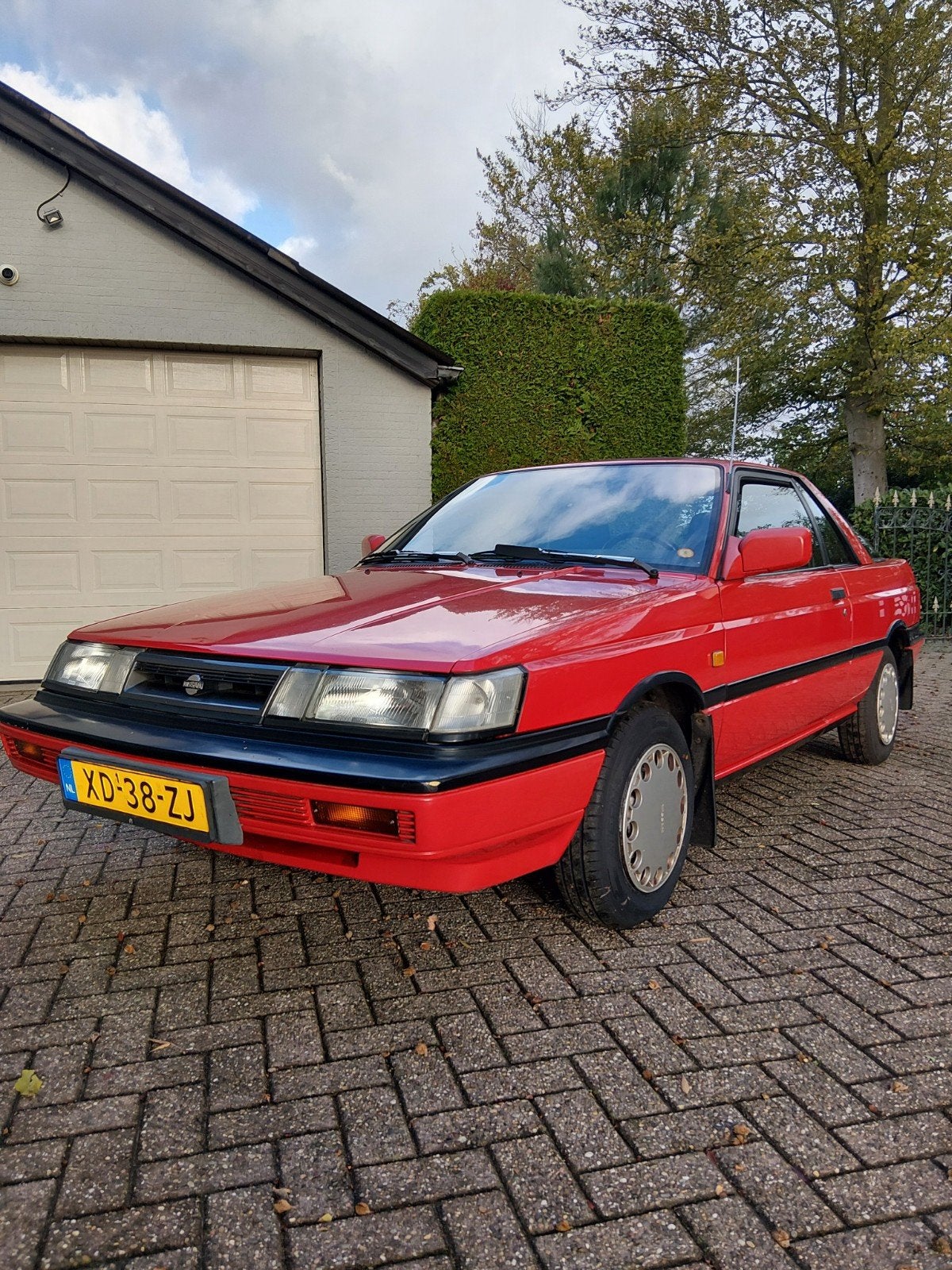 Nissan Sunny 1.6 I Coupe K6 1989 Rood, Auto's, Voorwielaandrijving, Origineel Nederlands, Handgeschakeld, Particulier
