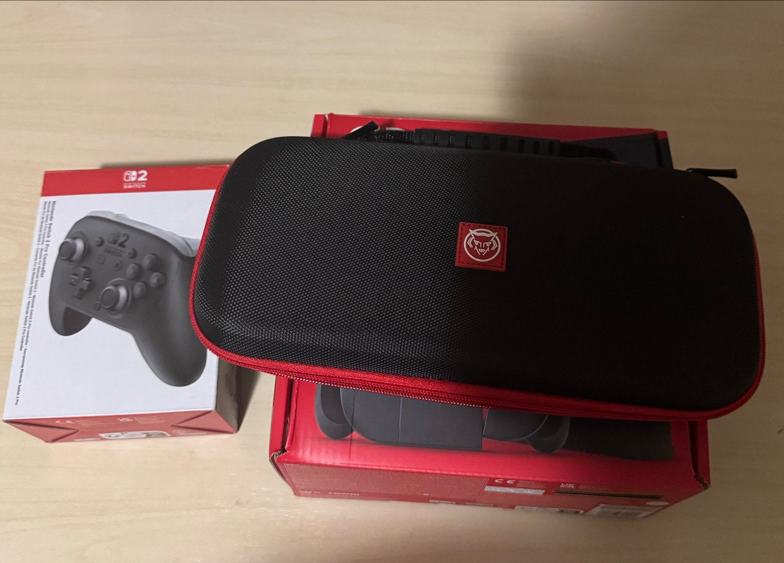 Foto 3 van Switch 2 met controller en beschermtas