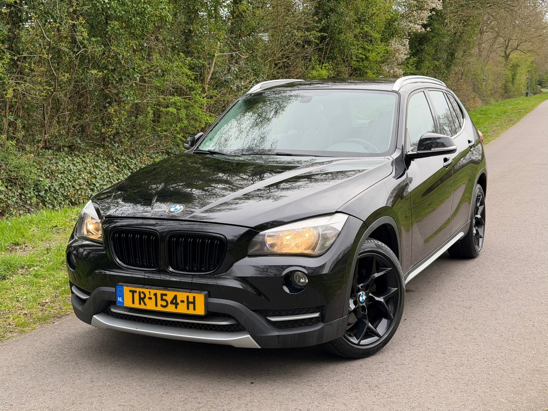 BMW X1 XDrive18d Business+ | Automaat + Clima + Navi |, Euro 5, Zwart, Zwart, Leder