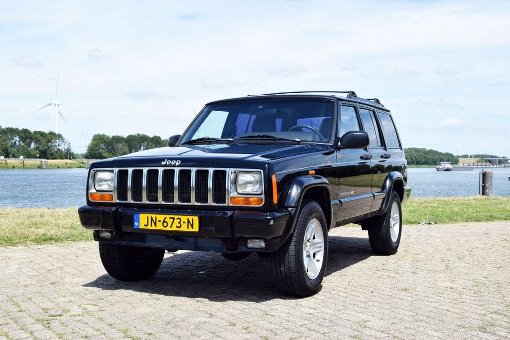 Jeep Cherokee 4.0i Limited (bj 2000, automaat), Auto's, Oldtimers, Cabriolet, Zwart, Leder, Geïmporteerd