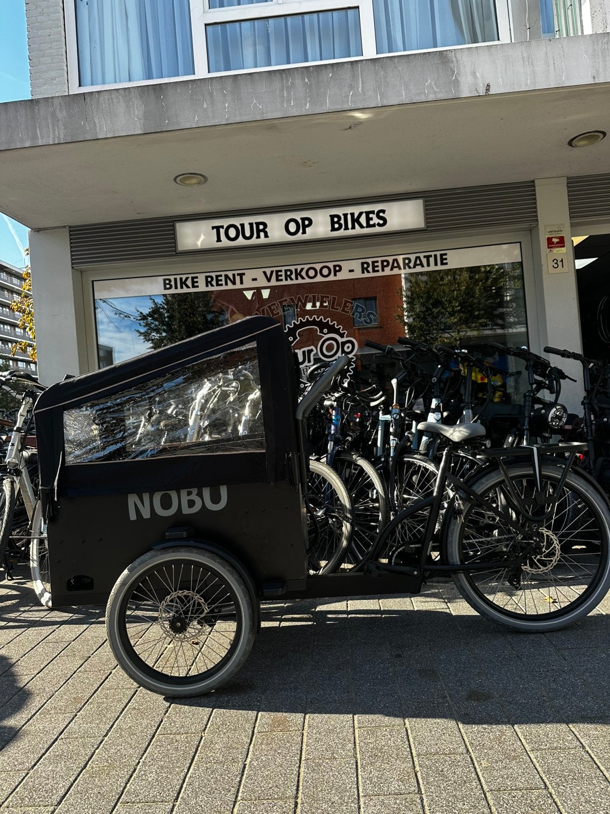 Elektriche Bakfiets 7sp inc garantie en huif ZGANsupper deal, 1062bk, Tour op bikes, Zo goed als nieuw, Tour op bikes