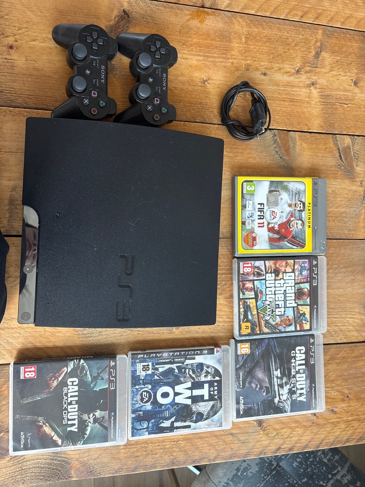 PlayStation 3 Slim met 2 controllers en 5 games, Met 2 controllers, Slim, Gebruikt, Met games