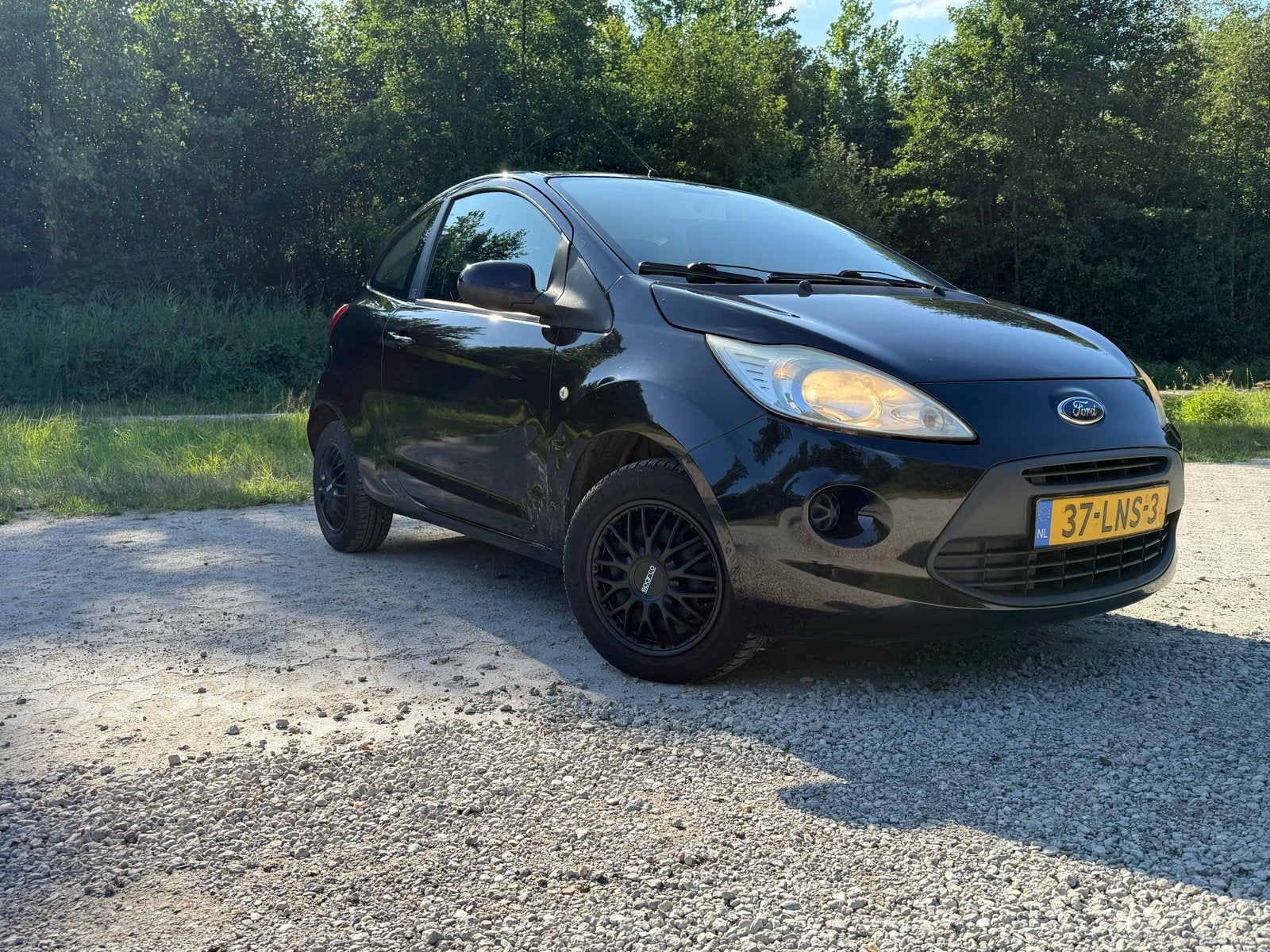 Ford Ka 1.2 51KW 2010 Zwart, Voorwielaandrijving, 1242 cc, 4 cilinders, 4 stoelen