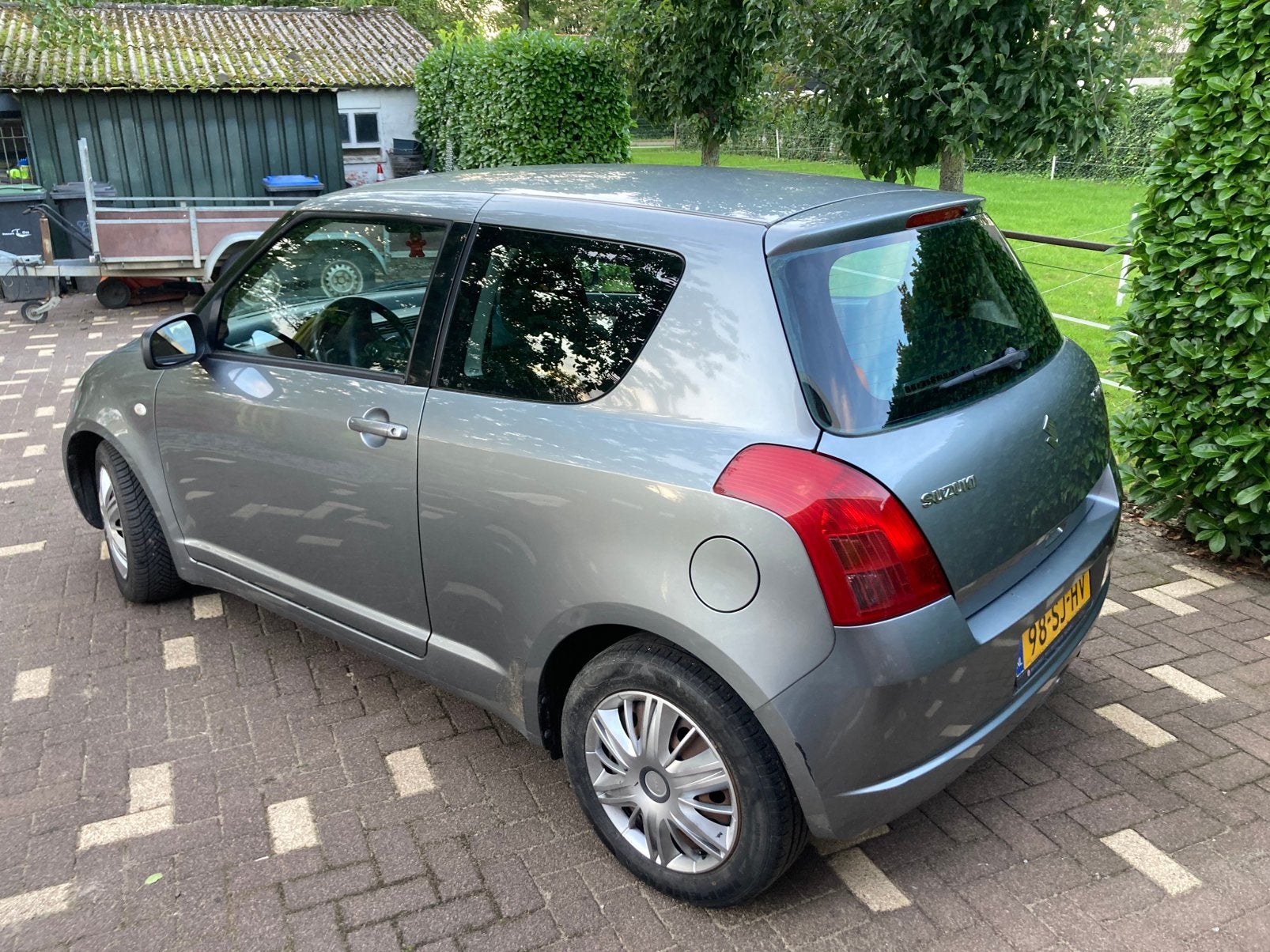 Suzuki Swift 1.3 3D 2006 Grijs, Auto's, 31 €/maand, Swift, Origineel Nederlands, Handgeschakeld