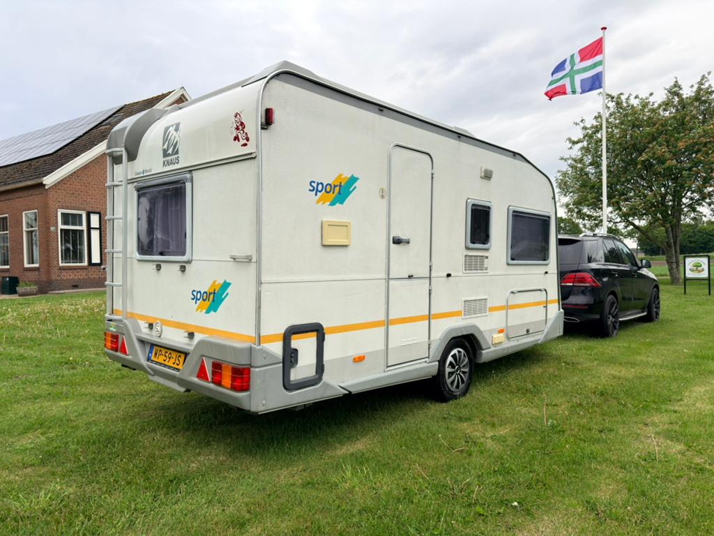 Knaus Sport 450 (1996) | Vast bed | Compleet uitgerust, Caravans en Kamperen, Caravans, Vast bed, Ringverwarming, Bedrijf, Treinzit