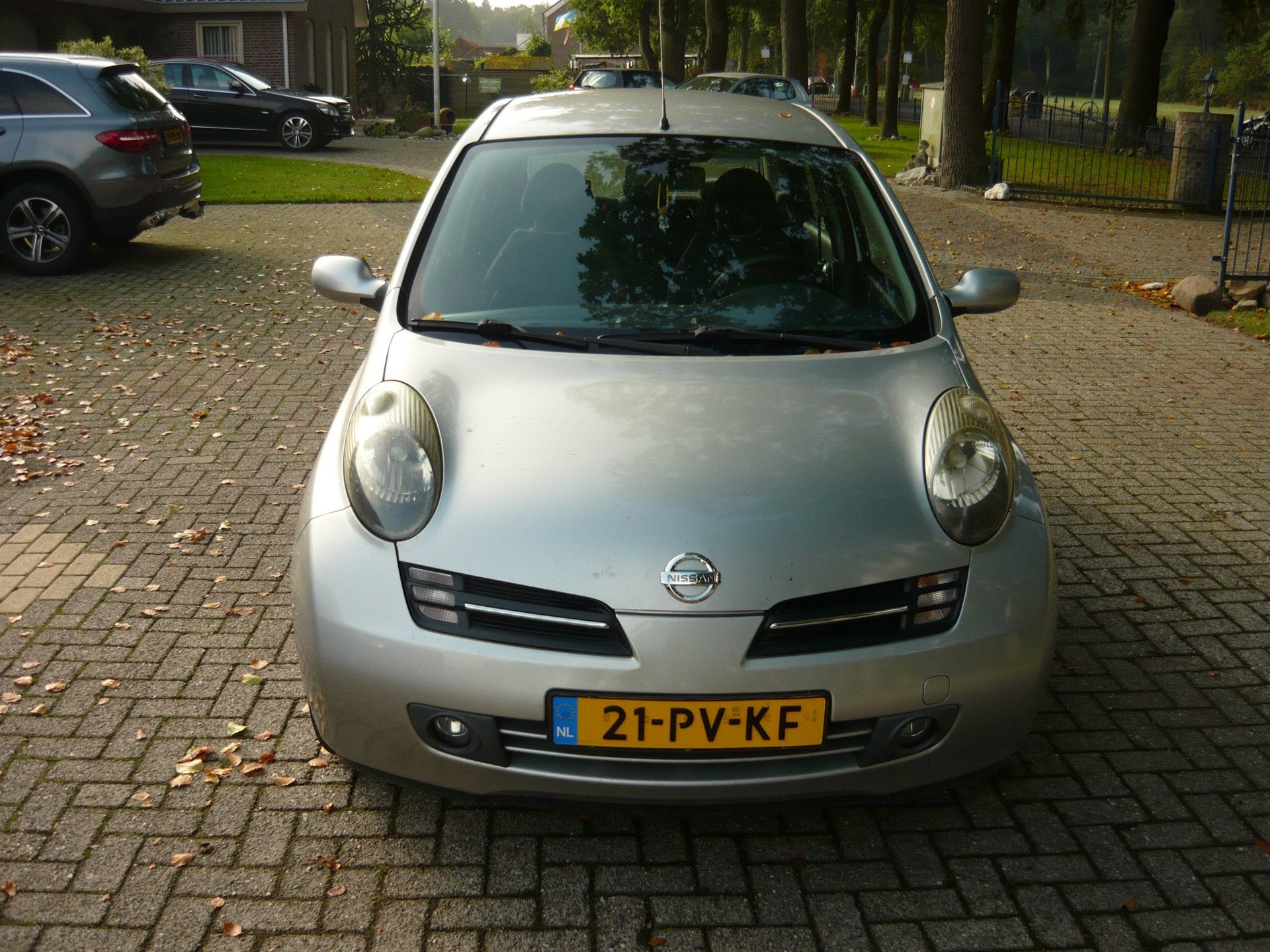 Nissan Micra 1.2 Tekna, Voorwielaandrijving, Stof, Metallic lak, 4 cilinders