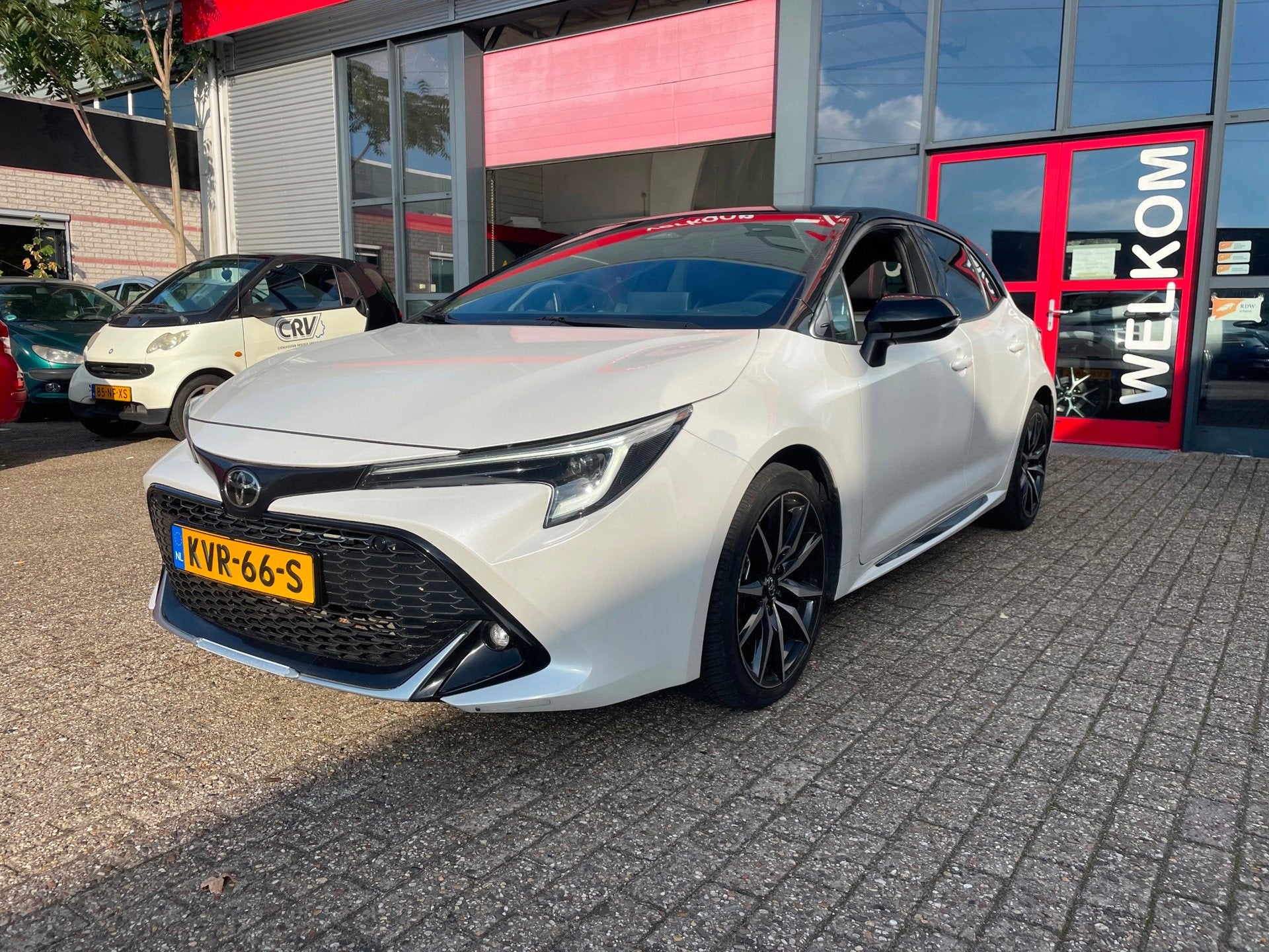 Toyota Corolla Hybrid 140 GR Sport nieuwstaat, Auto's, Dealer onderhouden, 450 kg, Gebruikt, 4 cilinders
