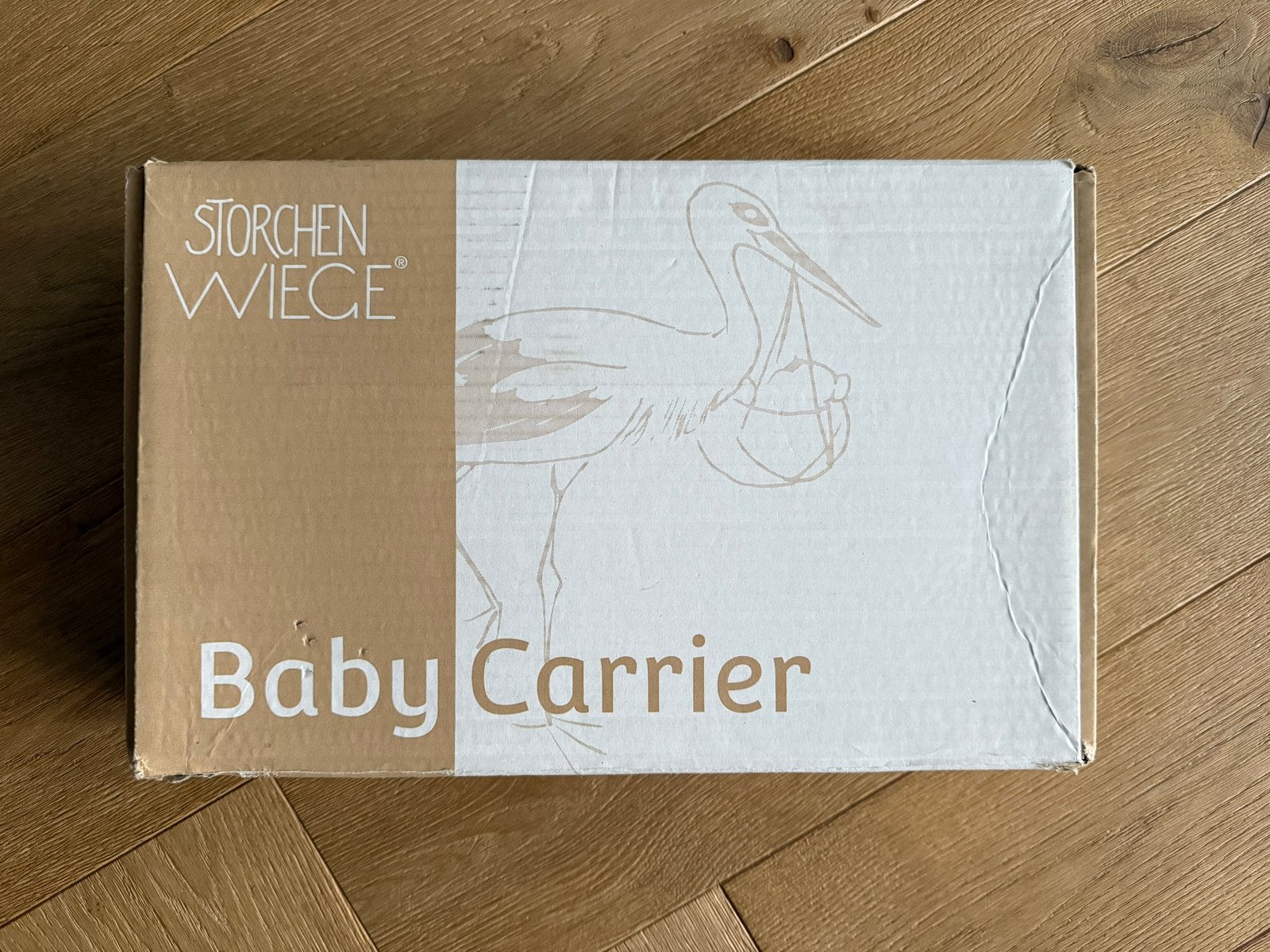 Storchenwiege Baby Carrier - Lichtblauw, Kinderen en Baby's, Babydragers en Draagdoeken, Overige merken, Buik of Rug, Ophalen of Verzenden