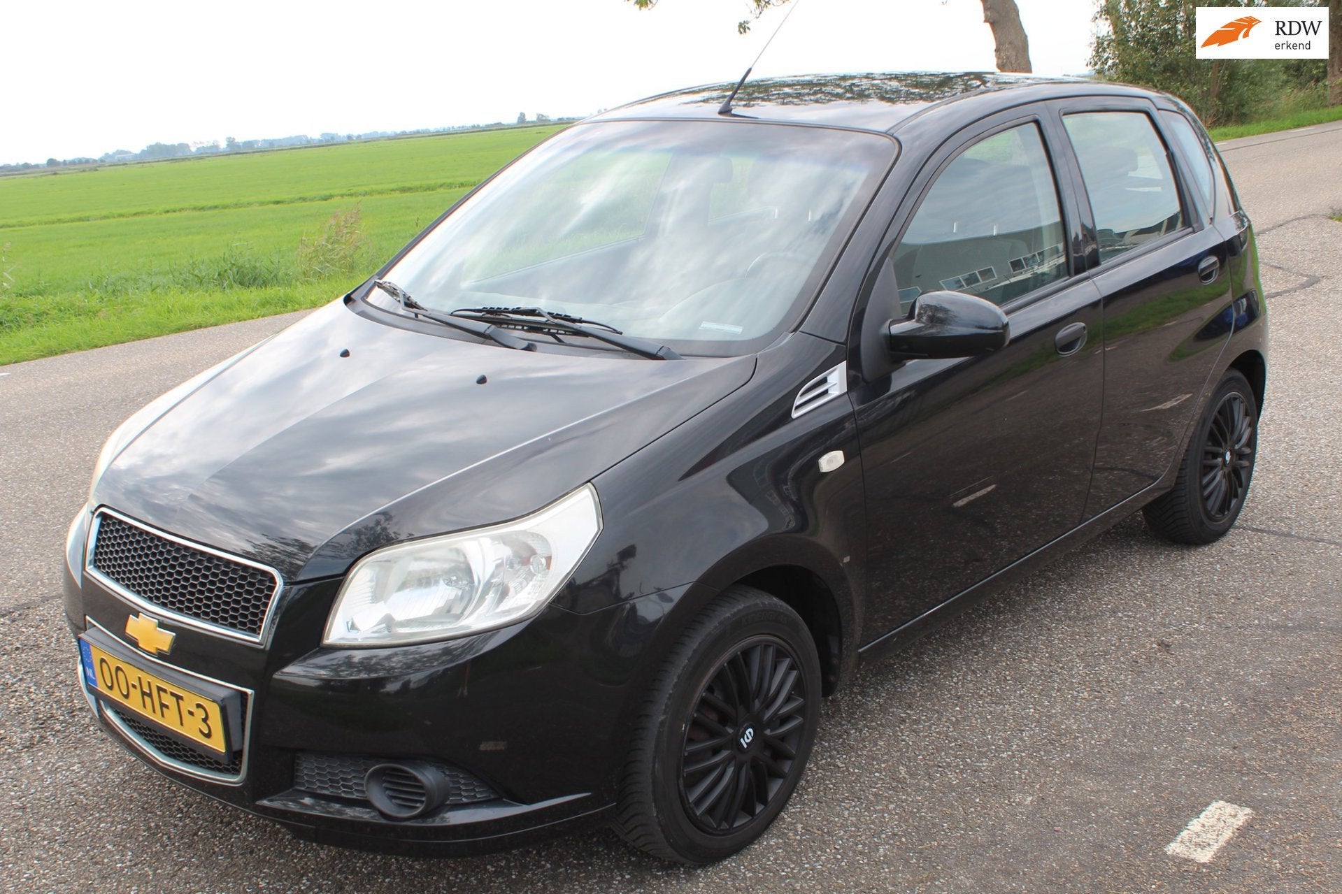 Chevrolet Aveo 1.4 16V LS // AUTOMAAT / 5-DRS //, Auto's, 4 cilinders, 400 kg, Origineel Nederlands, Bedrijf
