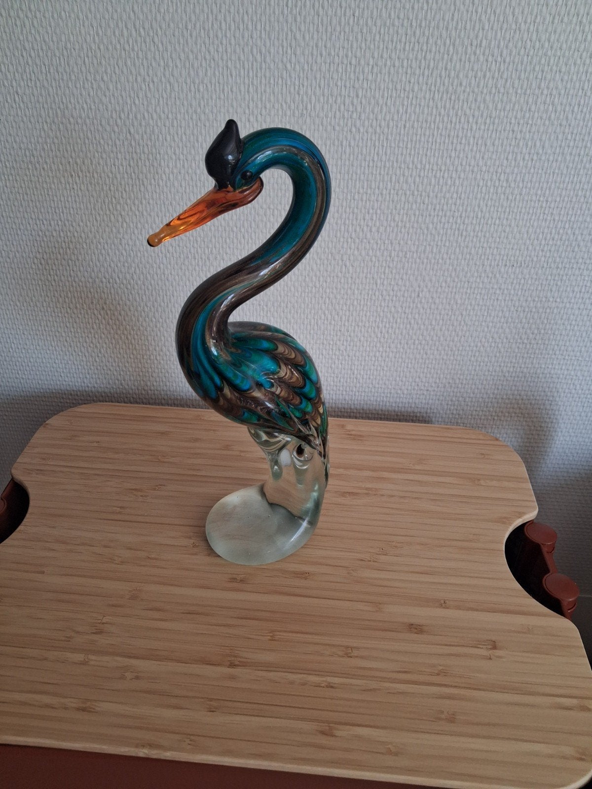pauw glas, Ophalen