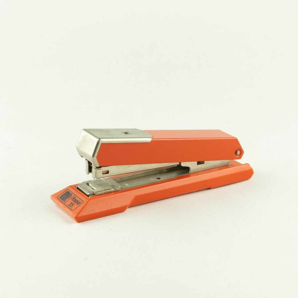 Vintage oranje Rapid 25 bureau-nietmachine, Gebruikt, Ophalen of Verzenden, Nvt, Nvt